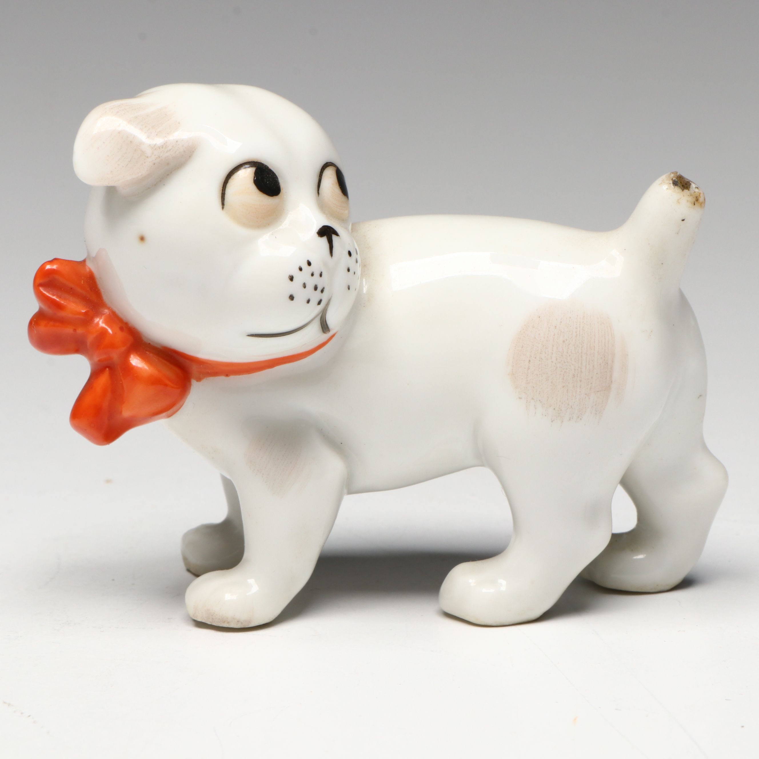 Porcelain Boy and Bulldog Figurines
