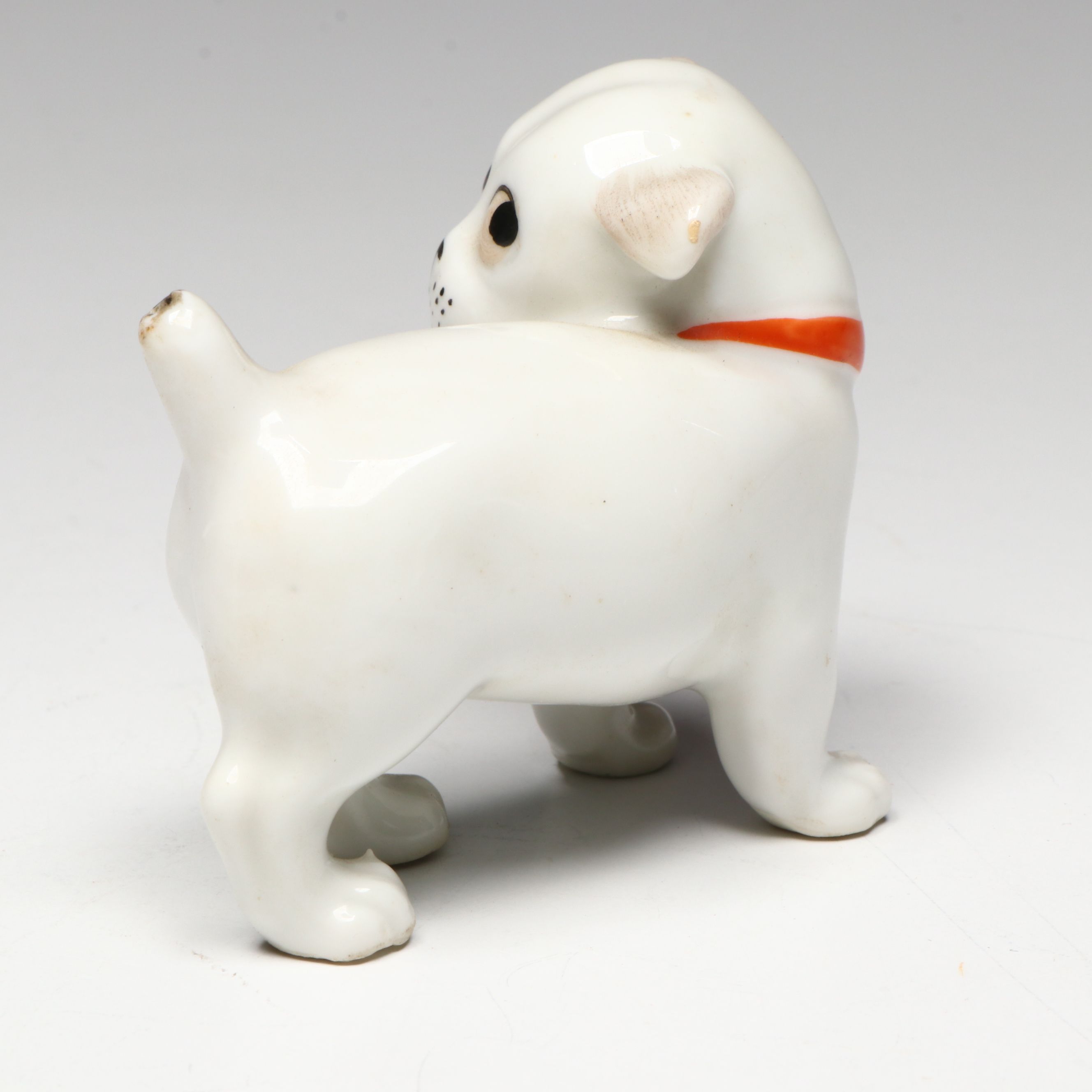 Porcelain Boy and Bulldog Figurines