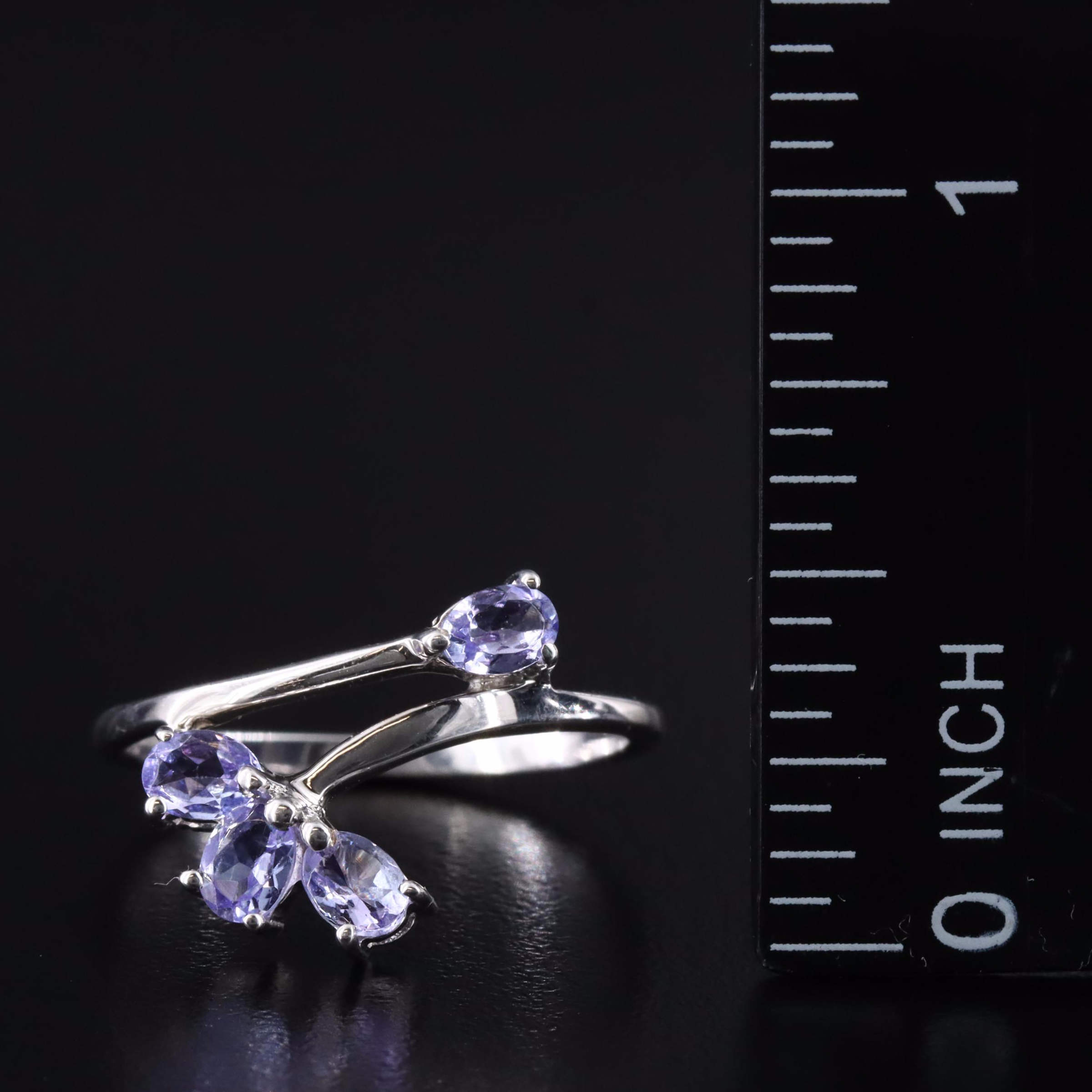 Sterling Tanzanite Contour and Bypass Rings