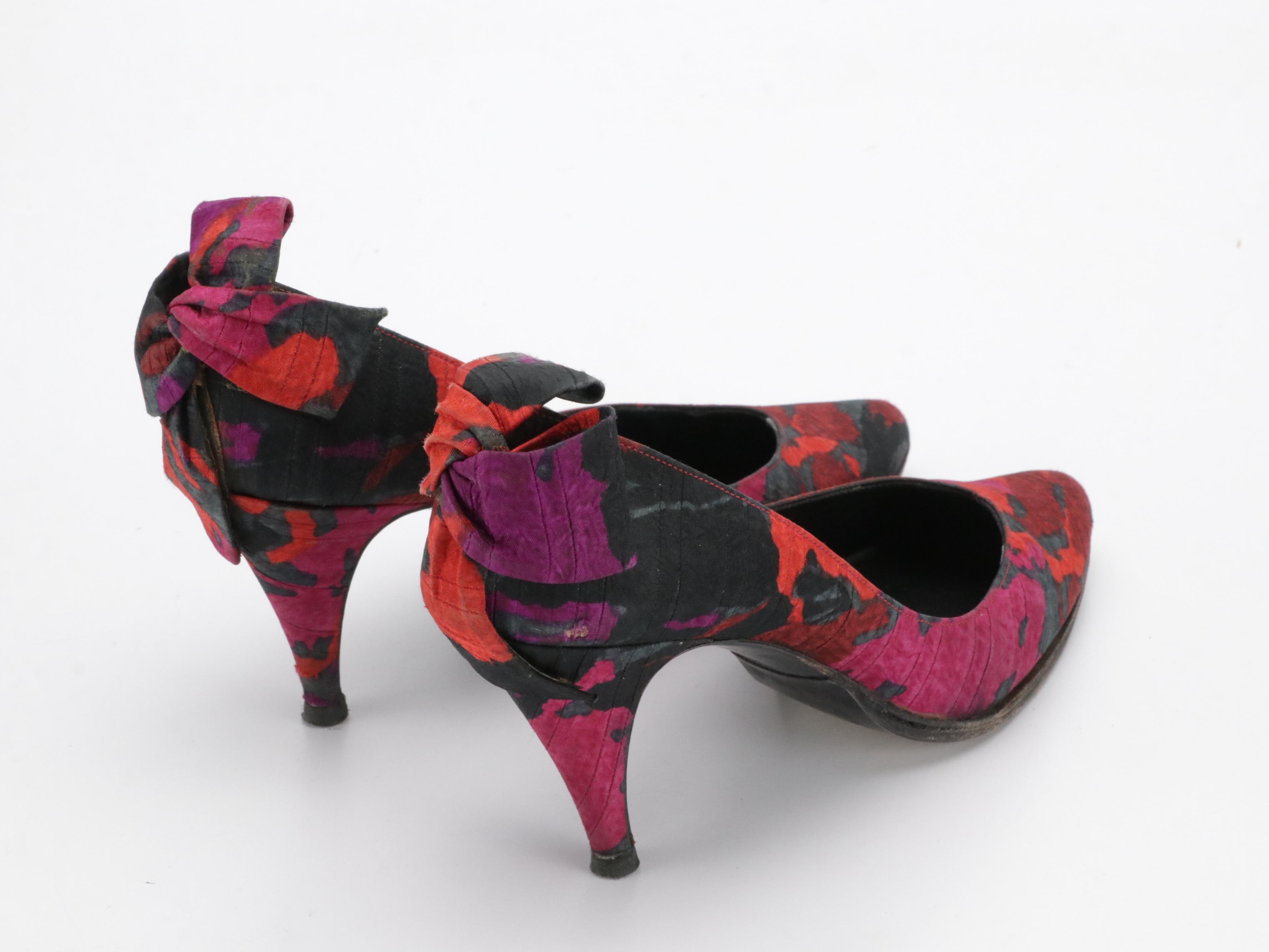Salvatore Ferragamo Magenta Suede Pumps and Stuart Weitzman Floral Bow Pumps
