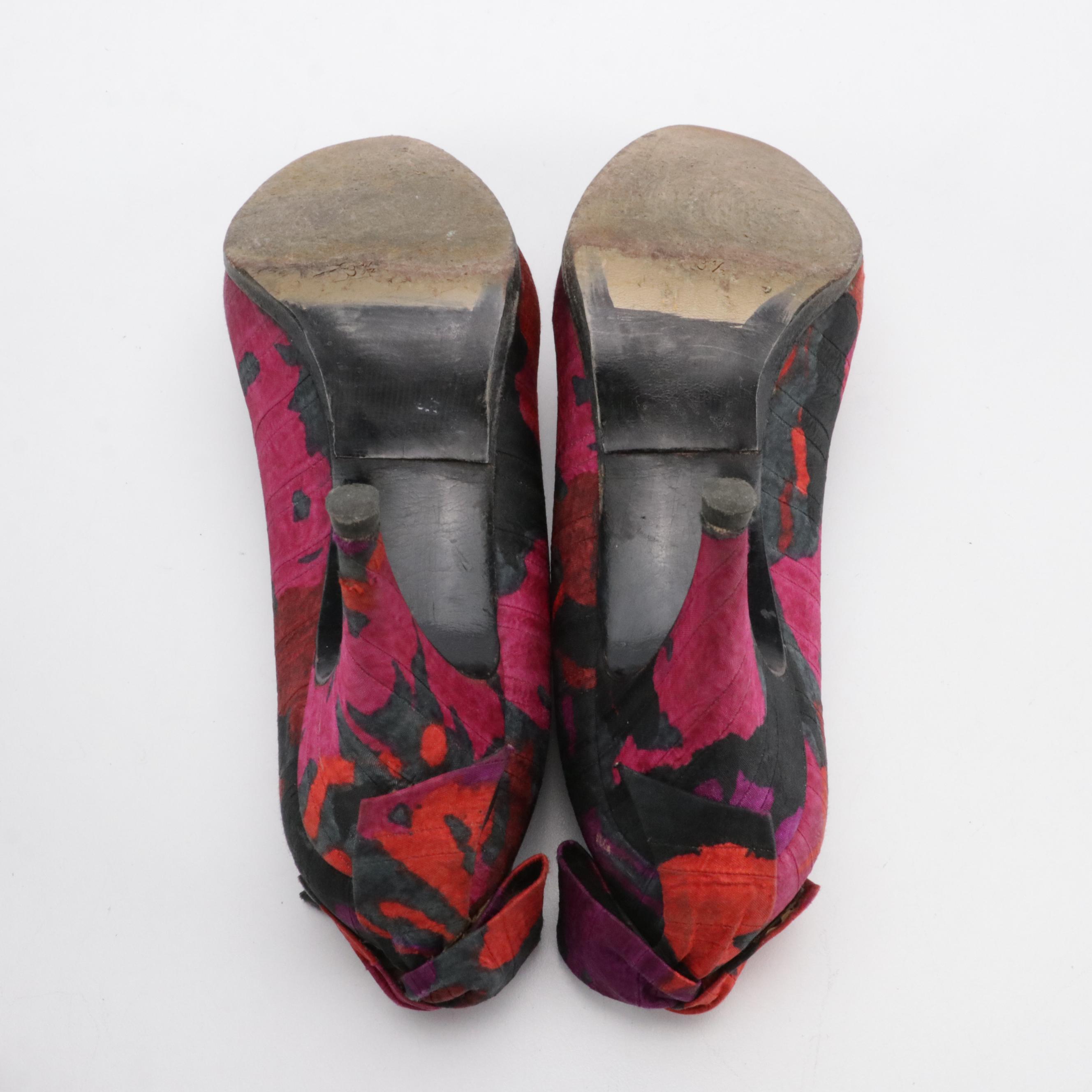 Salvatore Ferragamo Magenta Suede Pumps and Stuart Weitzman Floral Bow Pumps