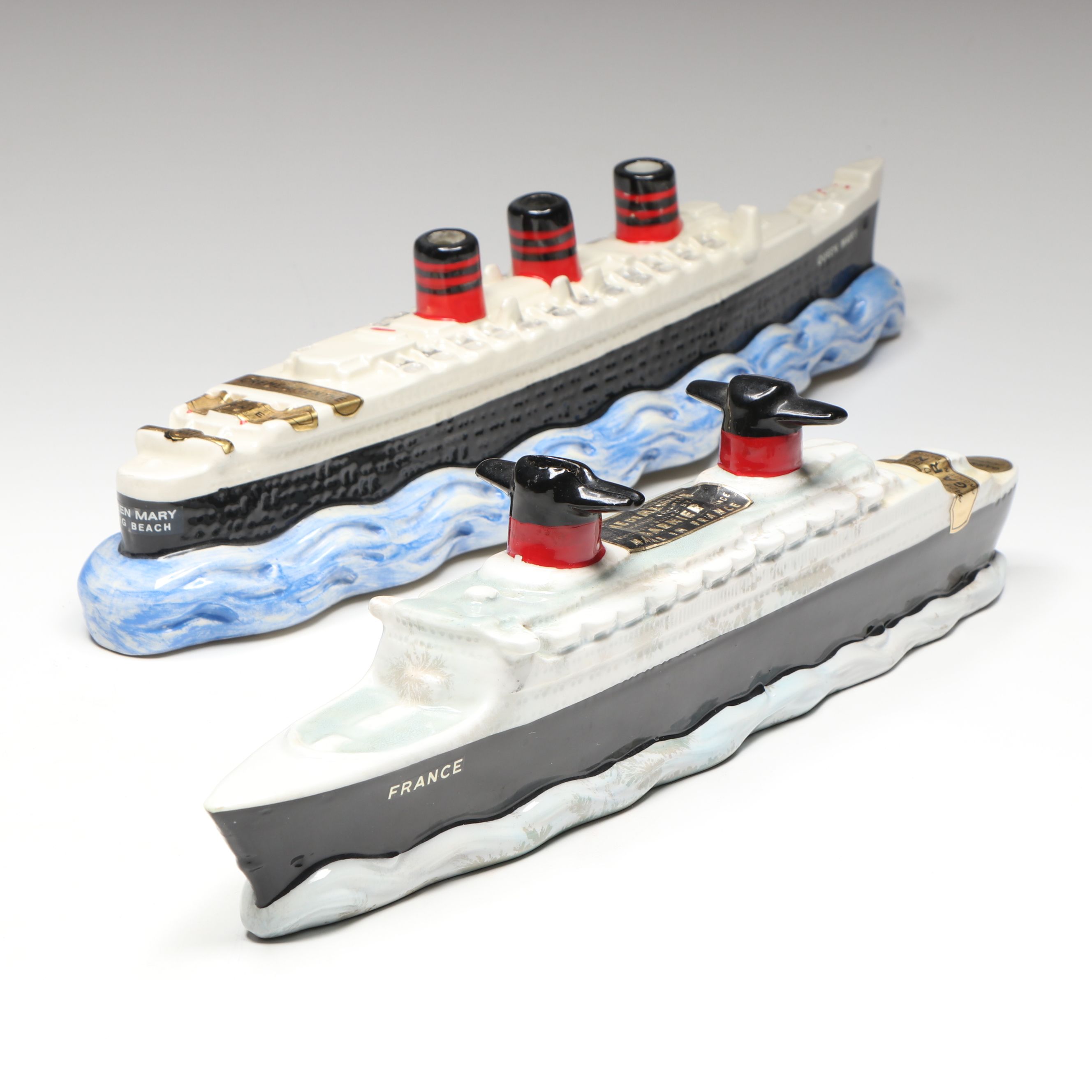 Garnier Hand-Painted Queen Mary and SS France Ceramic Decanters