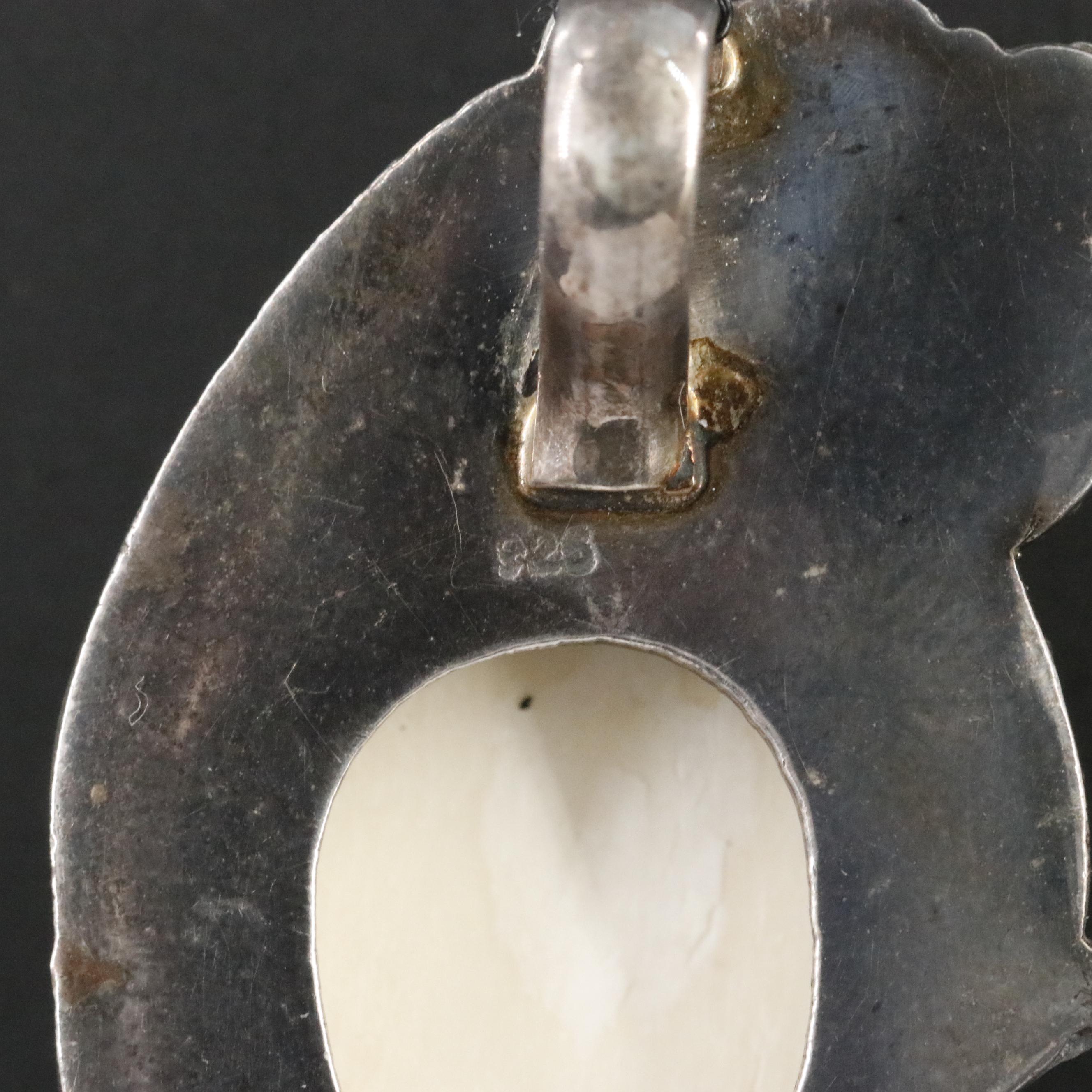 Sterling Carved Bone Goddess with Sapphire and Emerald Pendant