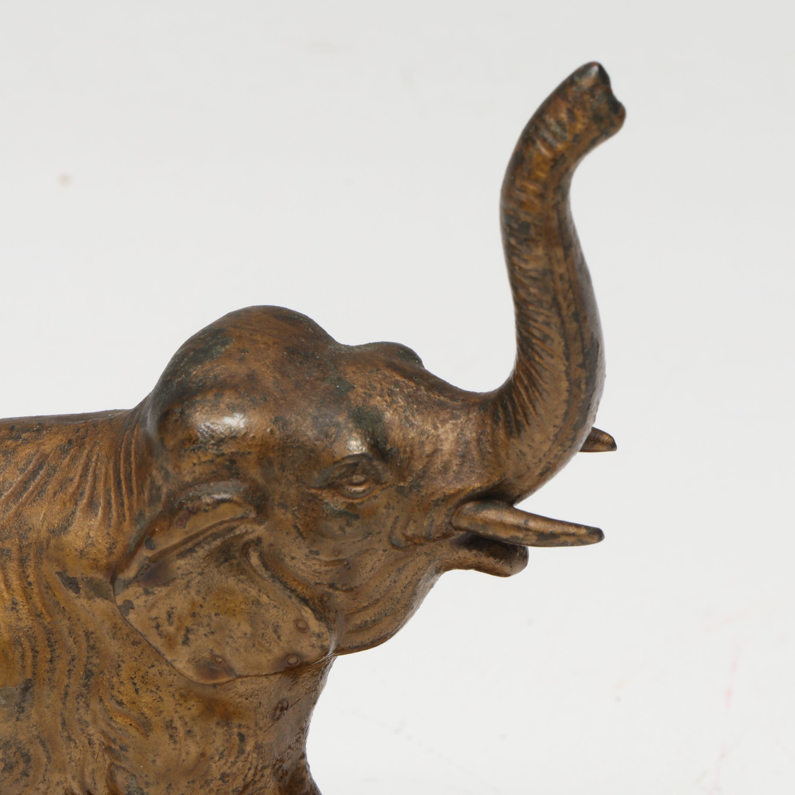 Bronze Finish Cast Iron Elephant with Raised Trunk, 20th Century