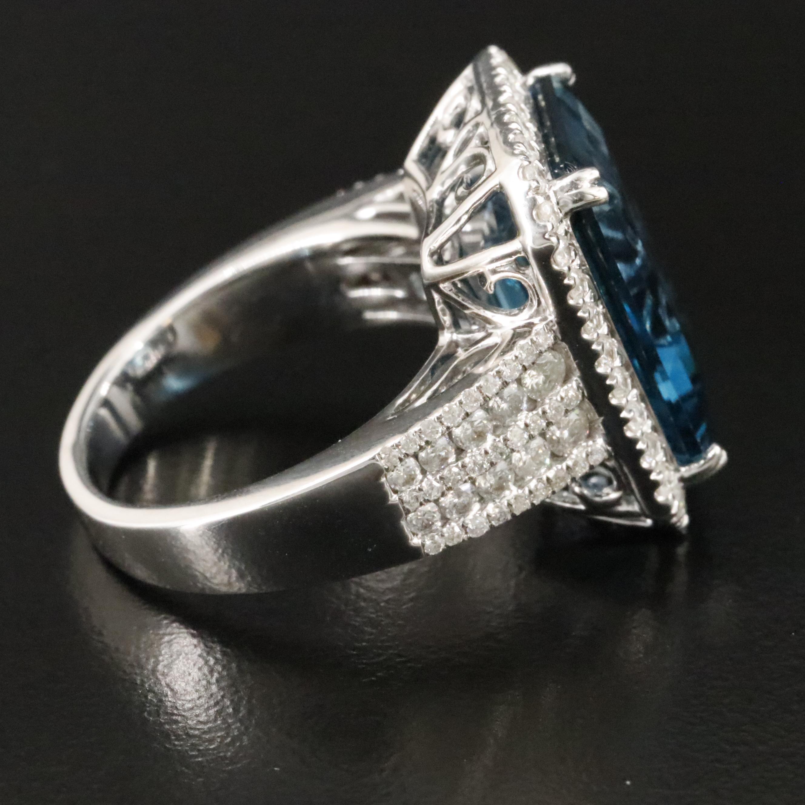 14K 12.66 CT London Blue Topaz and 1.22 CTW Diamond Ring