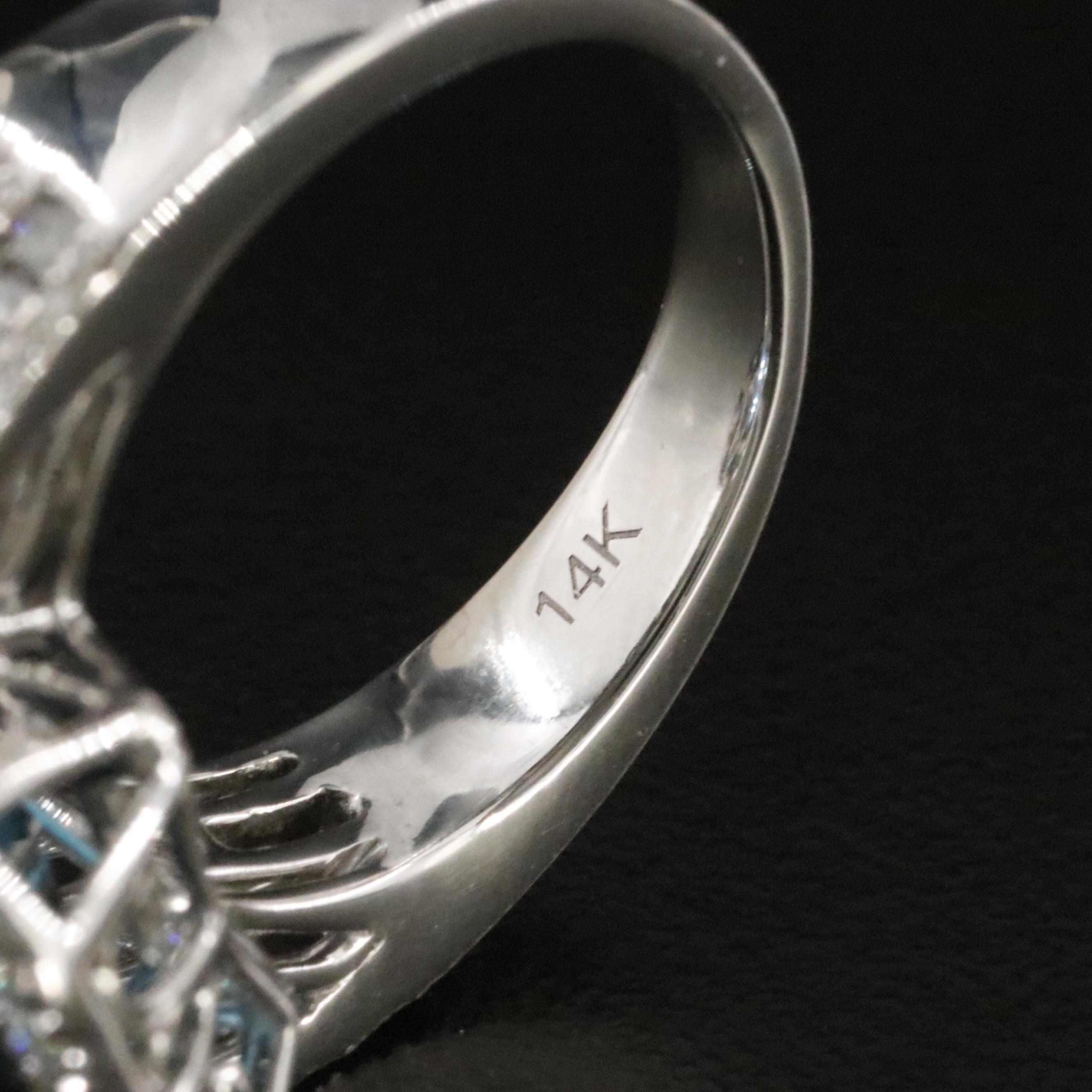 14K 12.66 CT London Blue Topaz and 1.22 CTW Diamond Ring