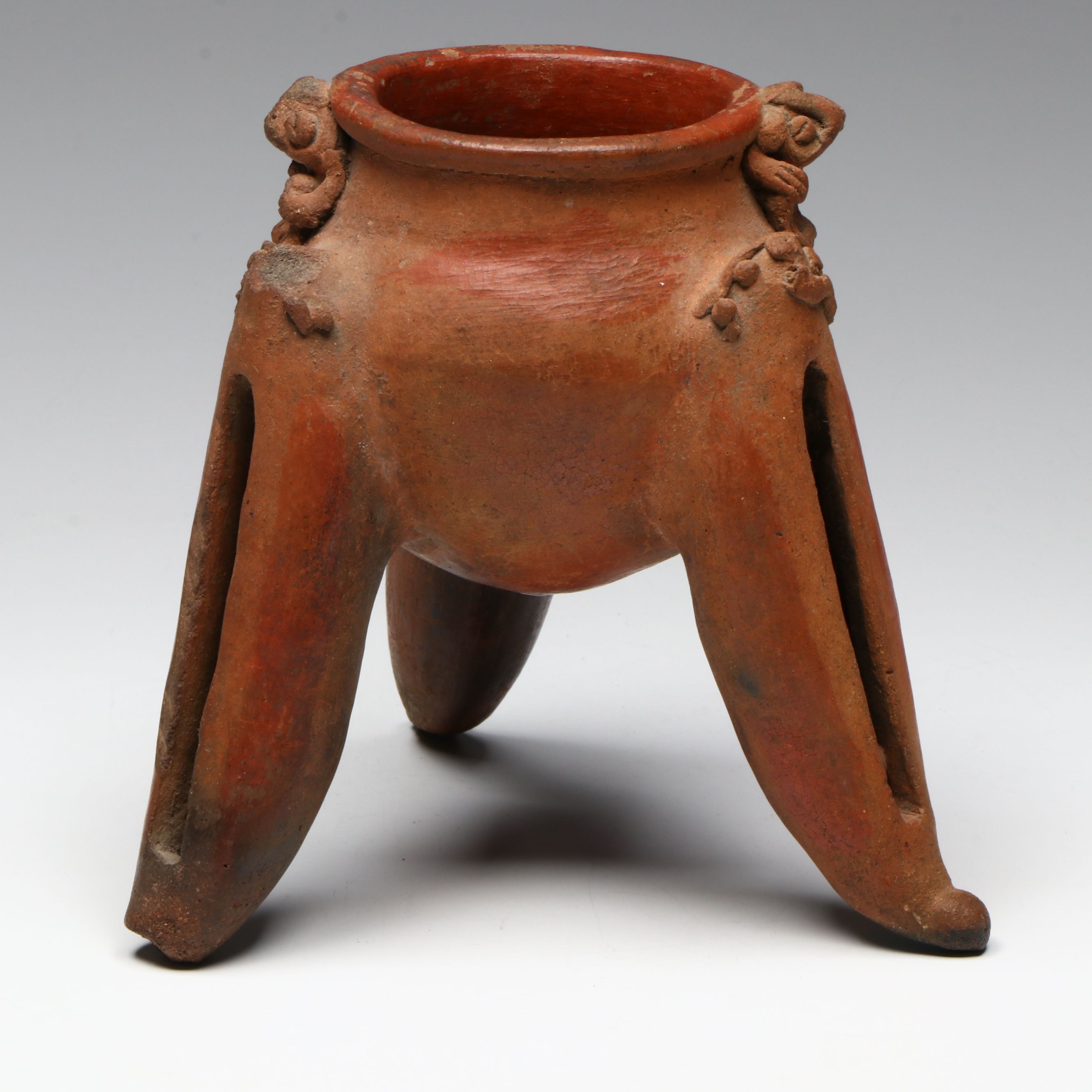 Pre-Columbian Chiriqui Pottery Tripod Vessel with Rim Creatures, Circa 700-1200