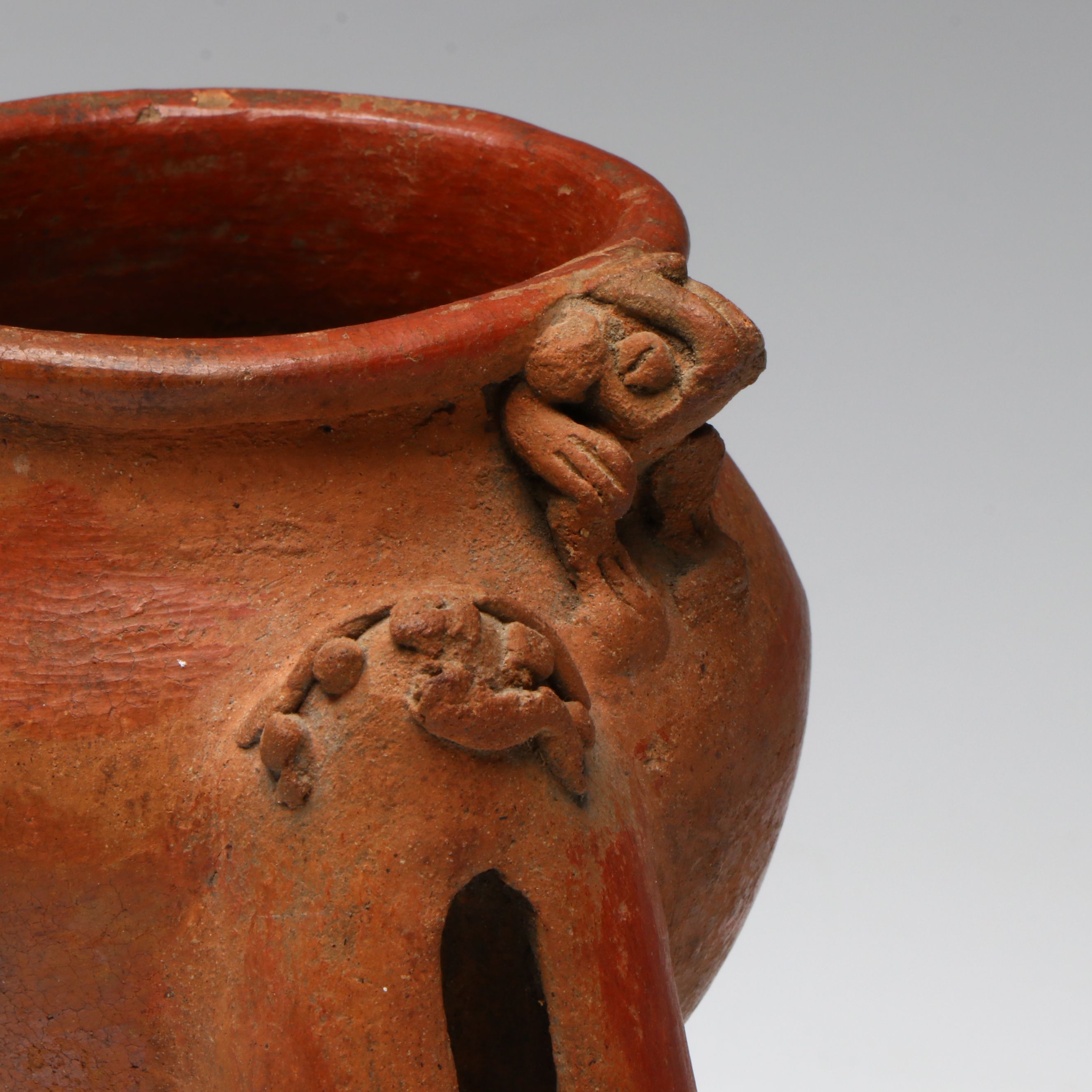Pre-Columbian Chiriqui Pottery Tripod Vessel with Rim Creatures, Circa 700-1200