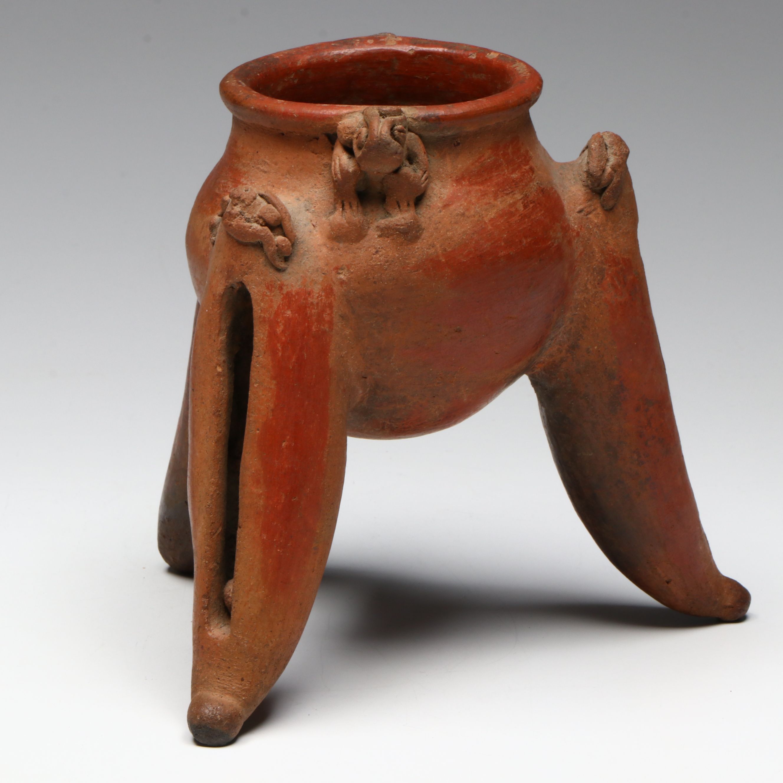 Pre-Columbian Chiriqui Pottery Tripod Vessel with Rim Creatures, Circa 700-1200