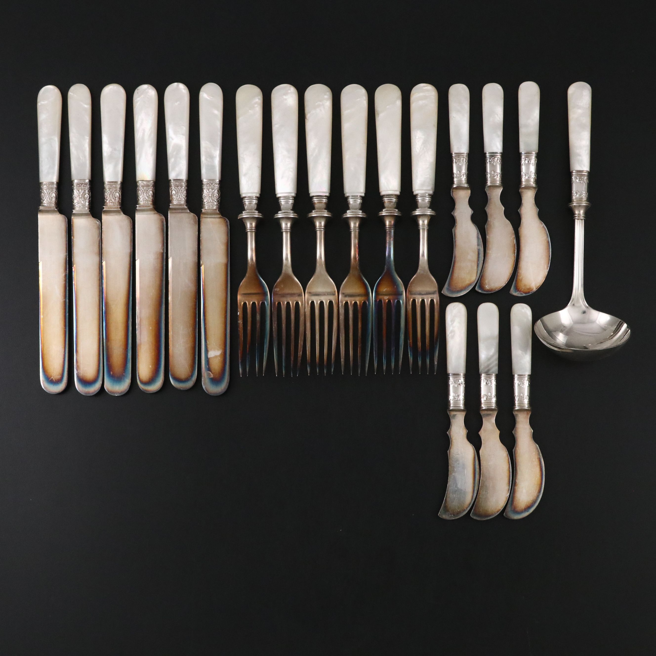 Landers, Frary, & Clark with Other Sterling Ferrule MOP Handled Flatware
