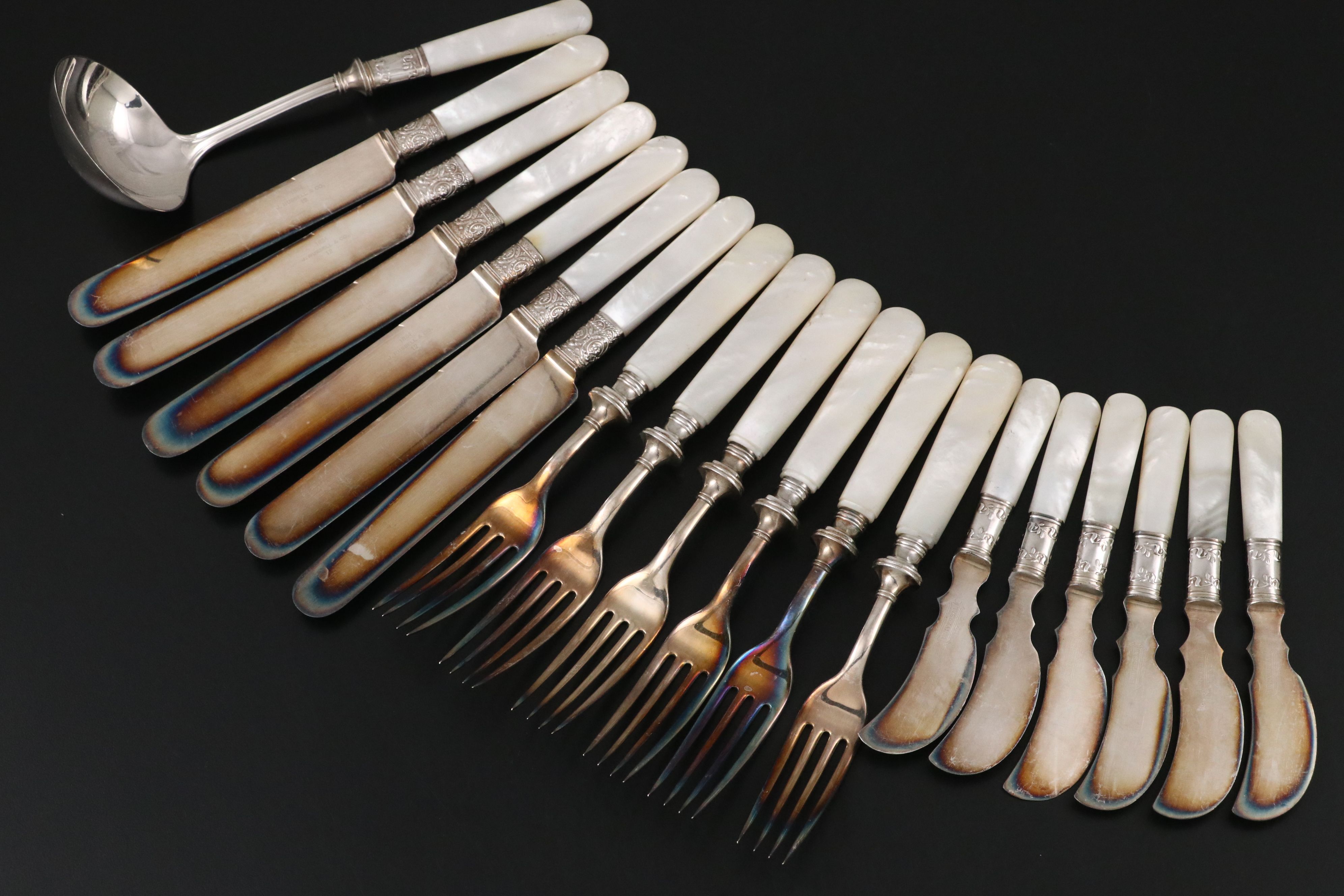 Landers, Frary, & Clark with Other Sterling Ferrule MOP Handled Flatware