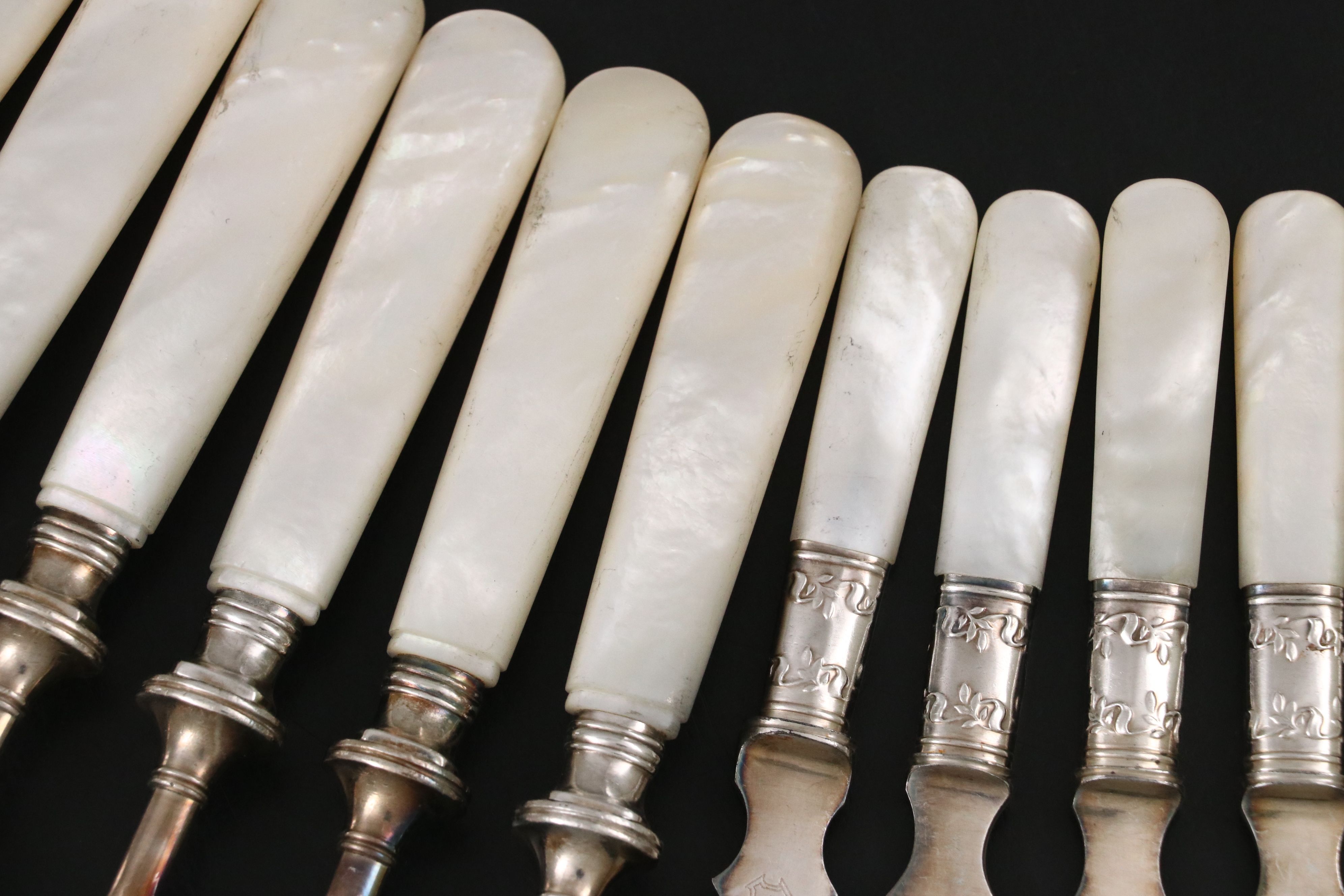Landers, Frary, & Clark with Other Sterling Ferrule MOP Handled Flatware