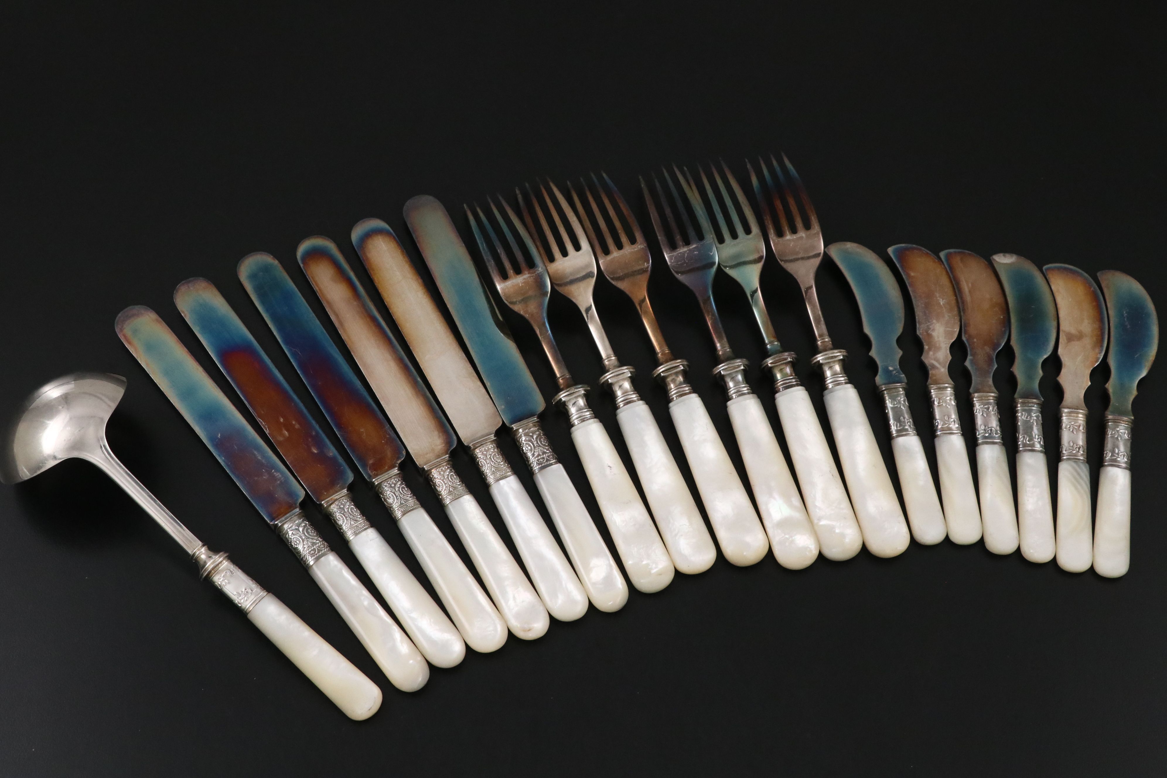 Landers, Frary, & Clark with Other Sterling Ferrule MOP Handled Flatware