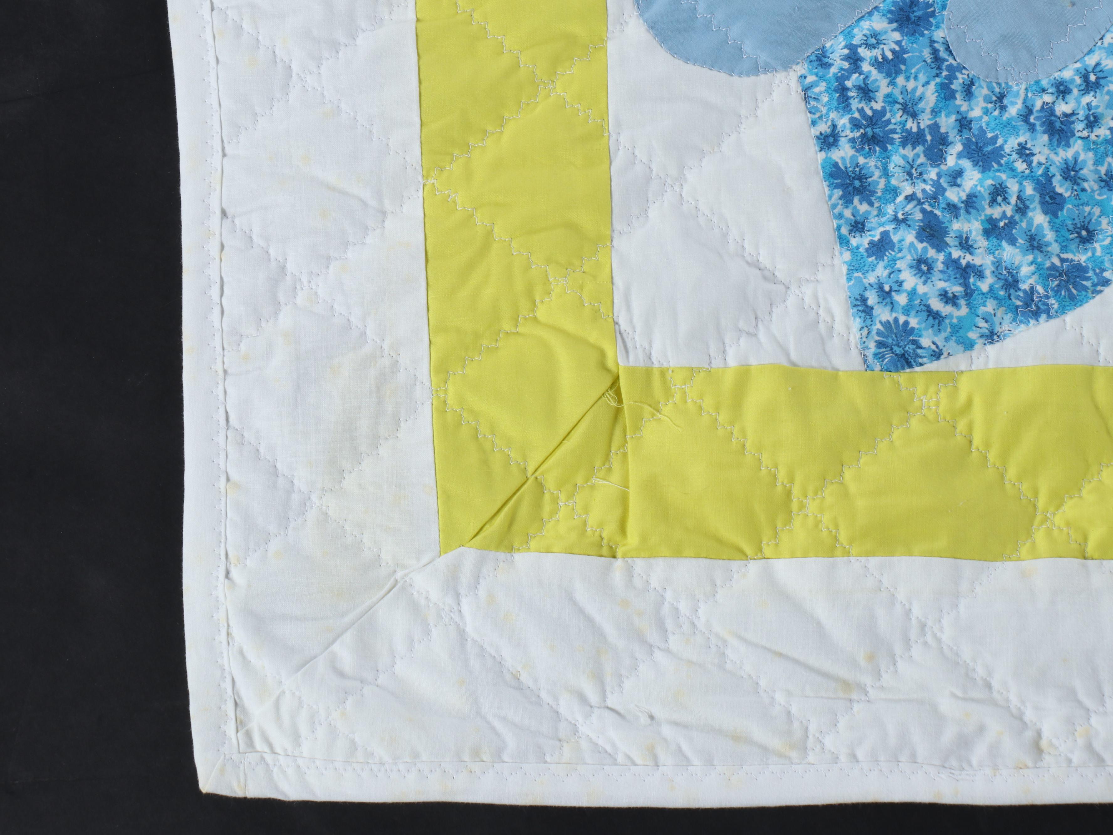 Hand-Pieced "Sunbonnet Sue" and Iris Blooms Appliquéd Quilts