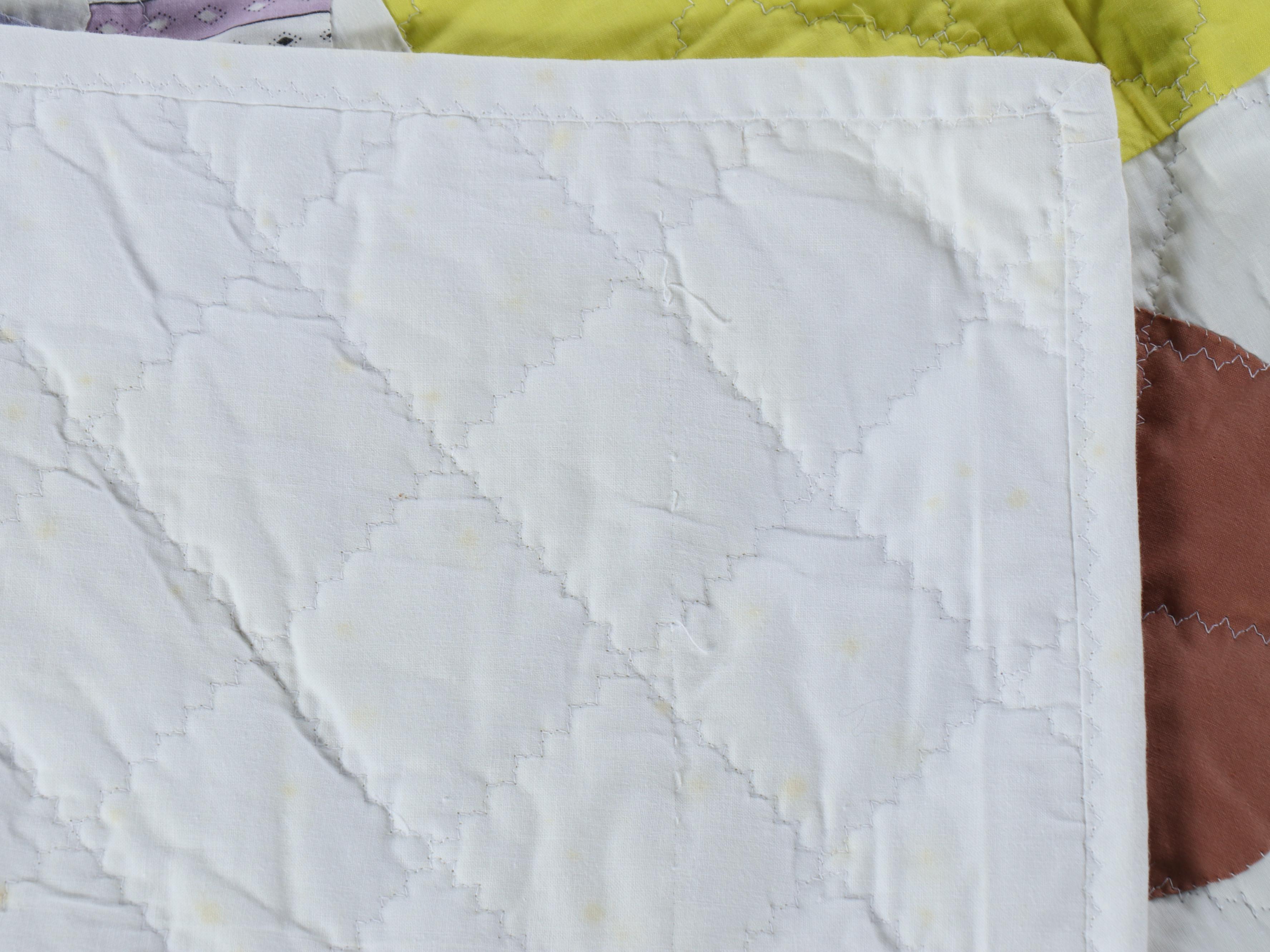 Hand-Pieced "Sunbonnet Sue" and Iris Blooms Appliquéd Quilts