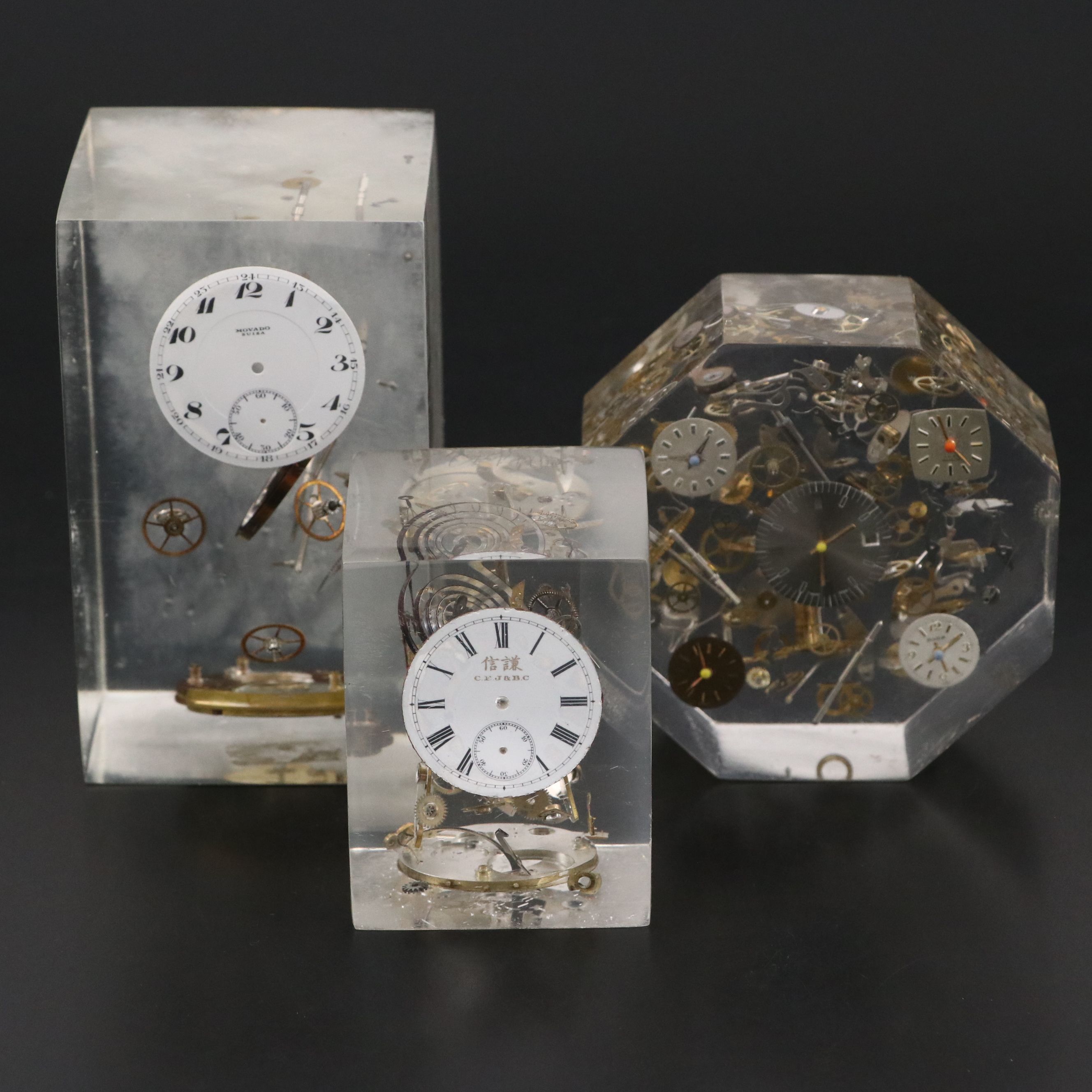 Floating Watch Faces and Mechanisms in Acrylic Blocks, 20th Century