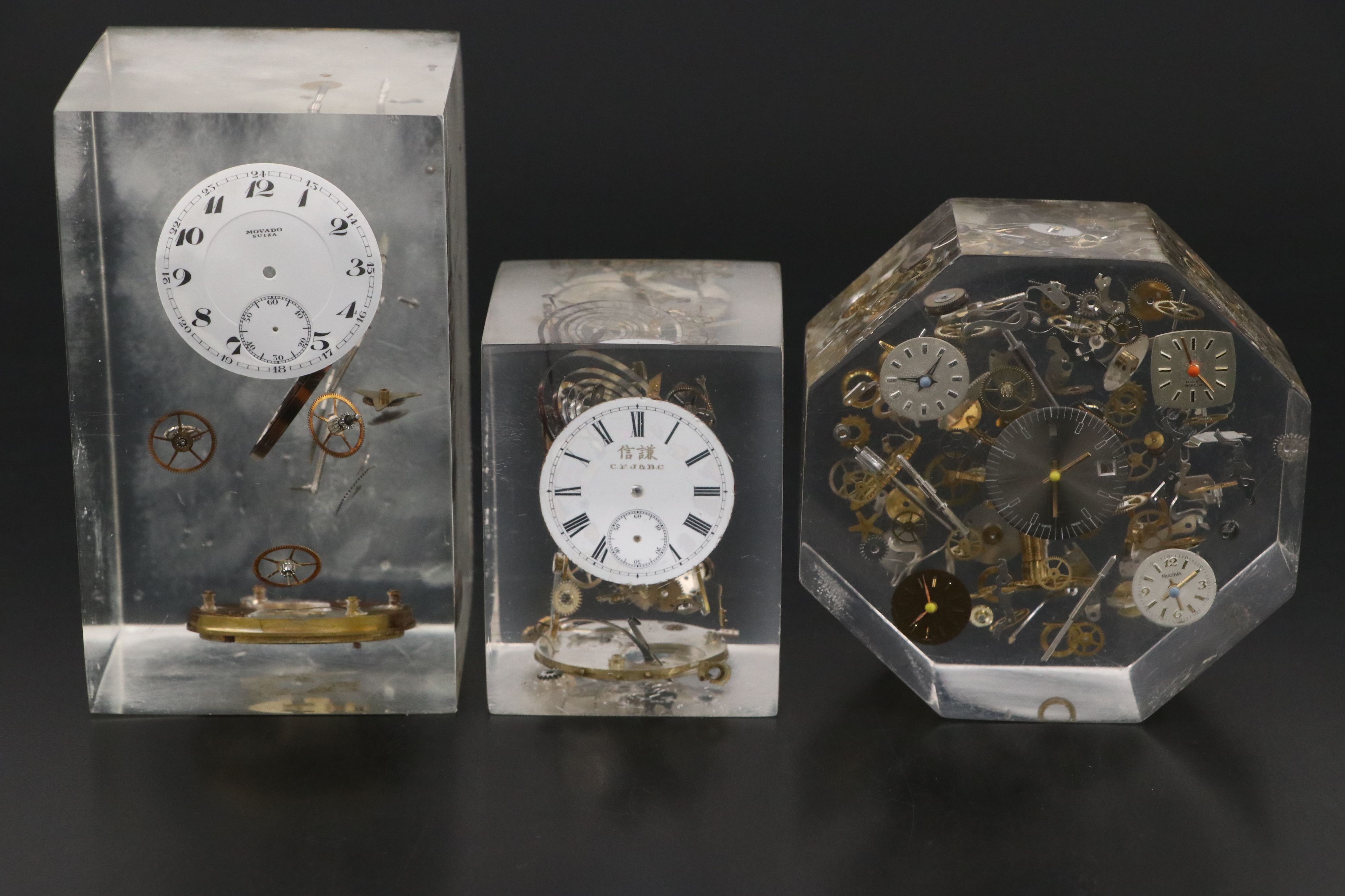 Floating Watch Faces and Mechanisms in Acrylic Blocks, 20th Century
