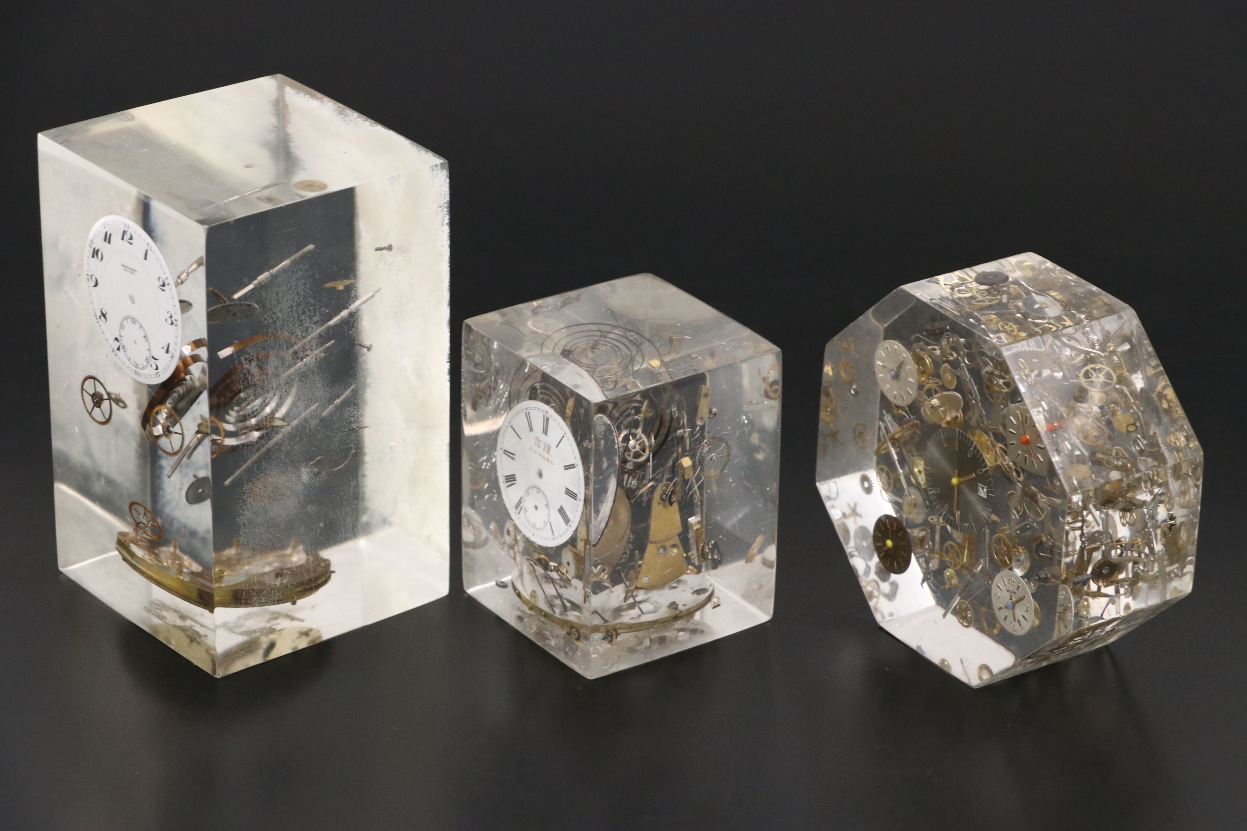 Floating Watch Faces and Mechanisms in Acrylic Blocks, 20th Century