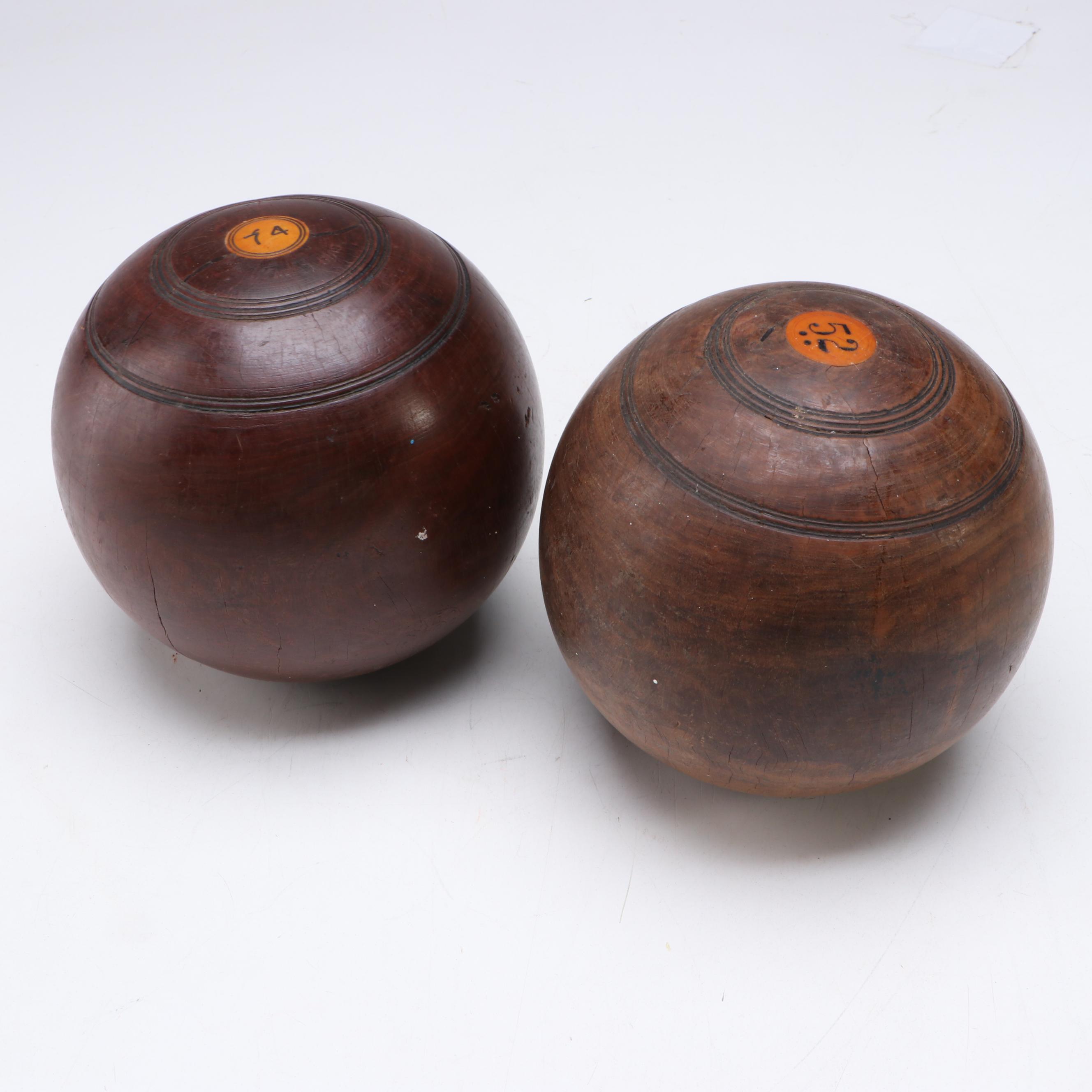 M.T.C. and E.P.P. Carved Lignum Vitae Lawn Bowls with Personalized Discs