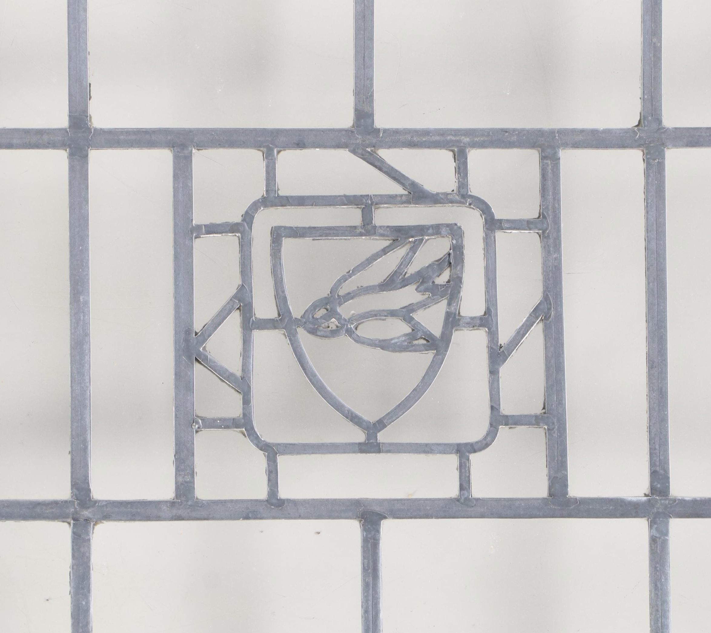 Stained Glass Window Pane with Swift in Shield Motif
