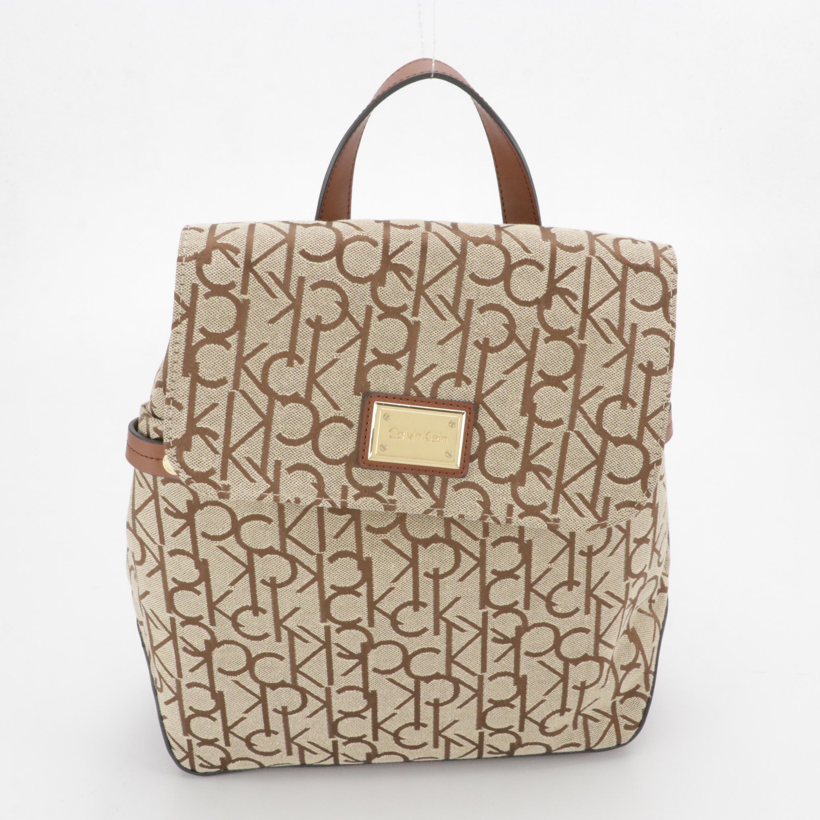 Dooney & Bourke Cooper Hobo Shoulder Bag & Calvin Klein Teodora Canvas Backpack