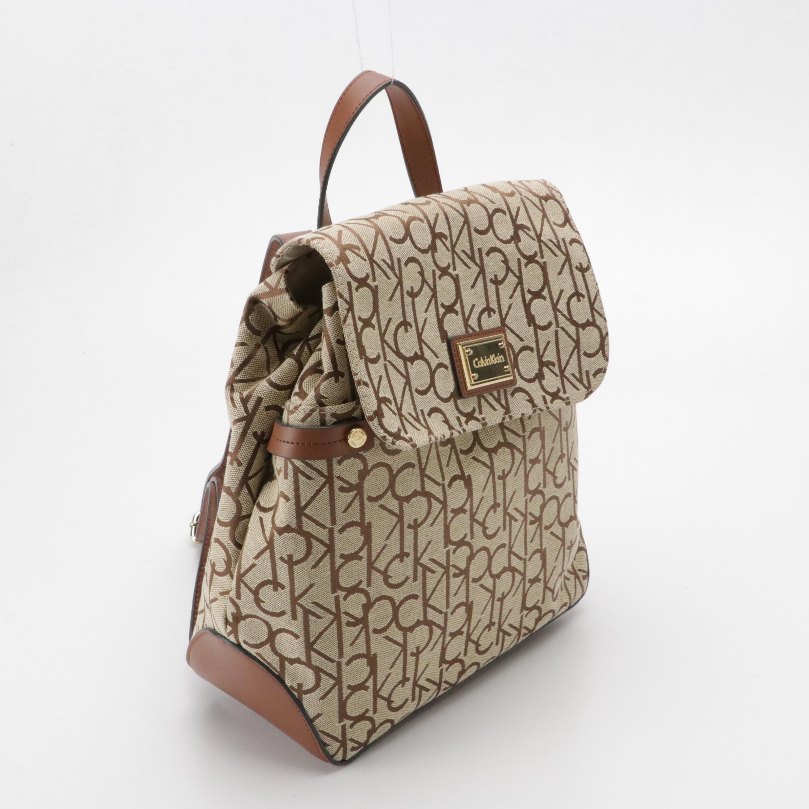 Dooney & Bourke Cooper Hobo Shoulder Bag & Calvin Klein Teodora Canvas Backpack