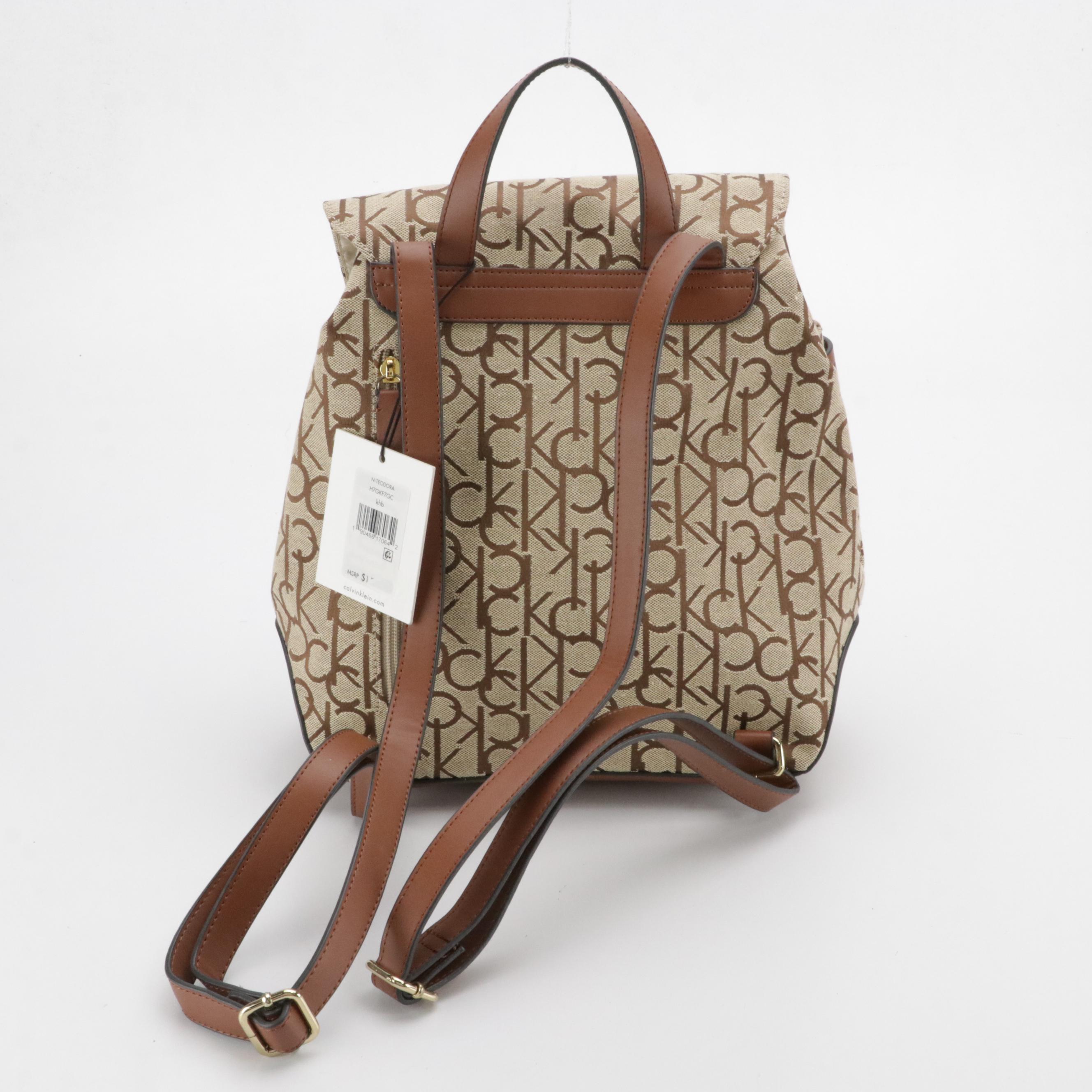 Dooney & Bourke Cooper Hobo Shoulder Bag & Calvin Klein Teodora Canvas Backpack