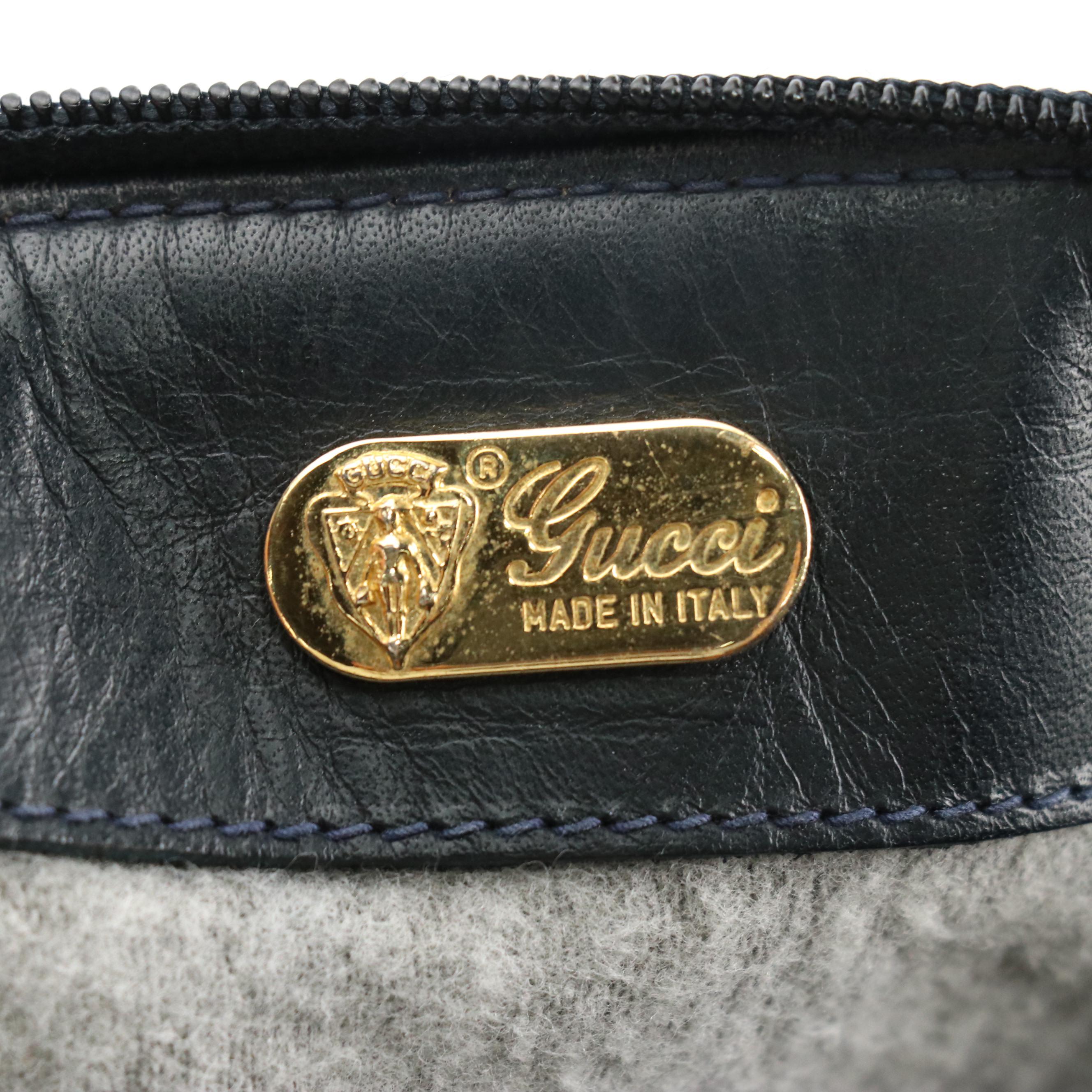 Gucci Interlocking GG Boston Bag in Micro GG Supreme Canvas and Navy Leather