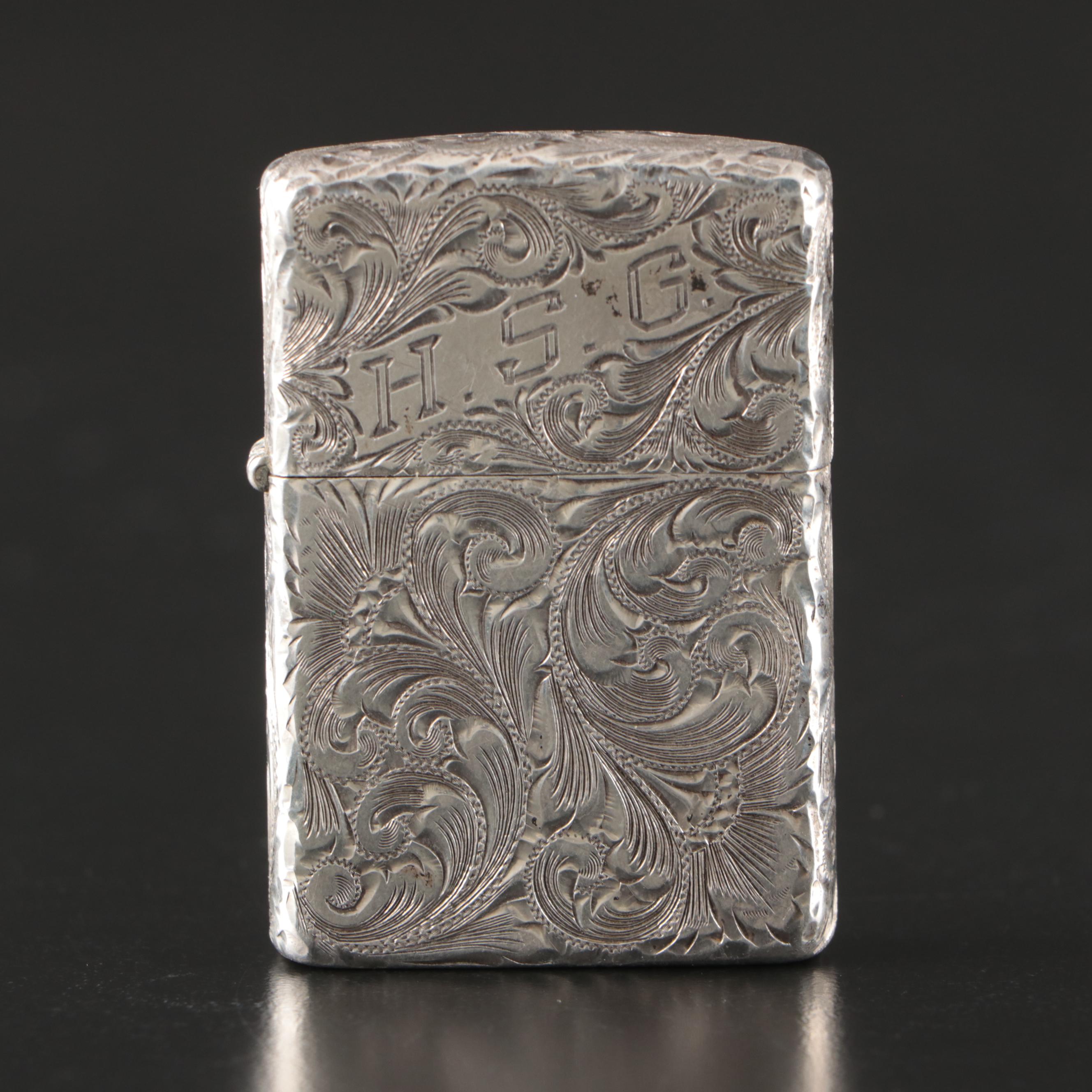 Zippo Sterling Silver Chased Lighter, 20th Century