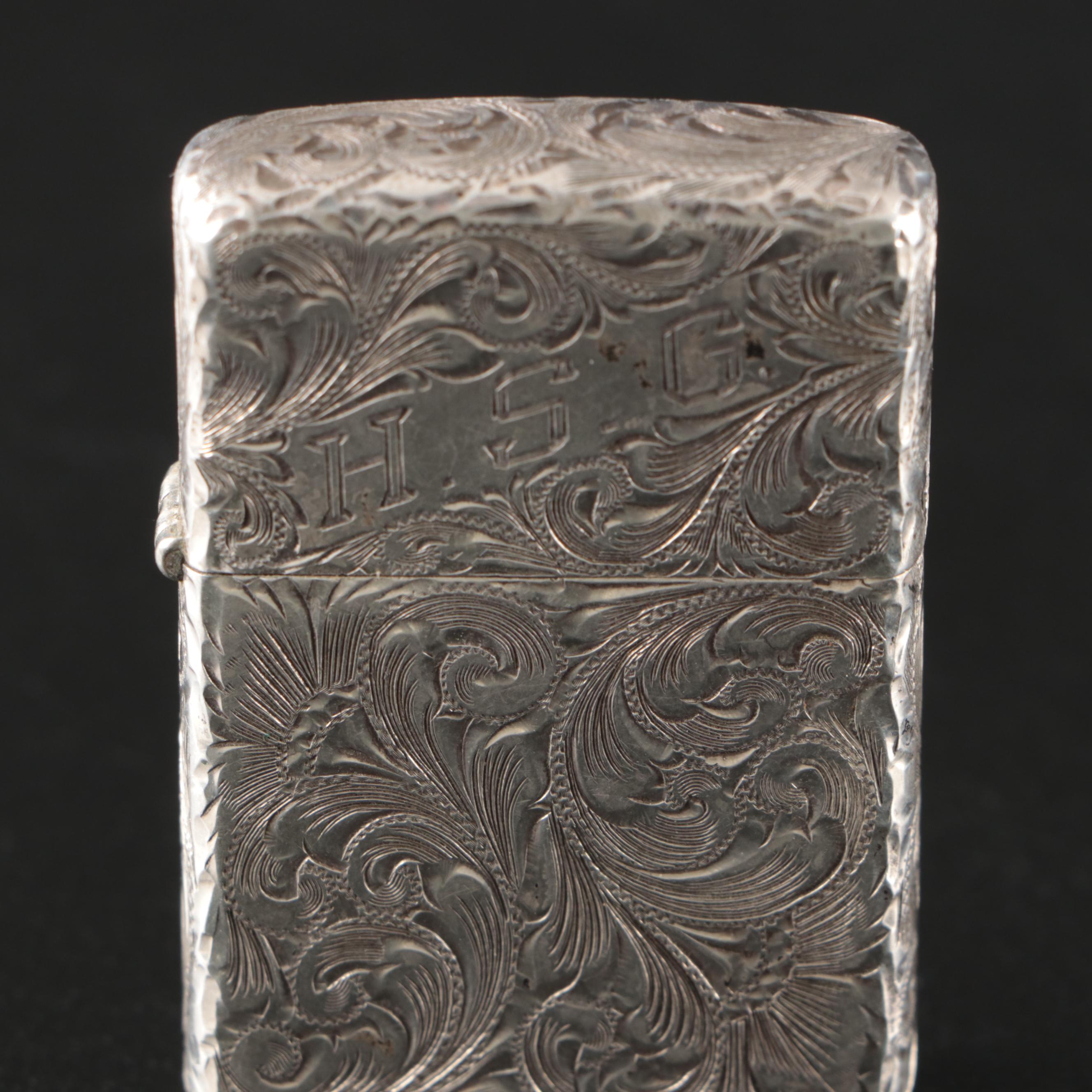 Zippo Sterling Silver Chased Lighter, 20th Century