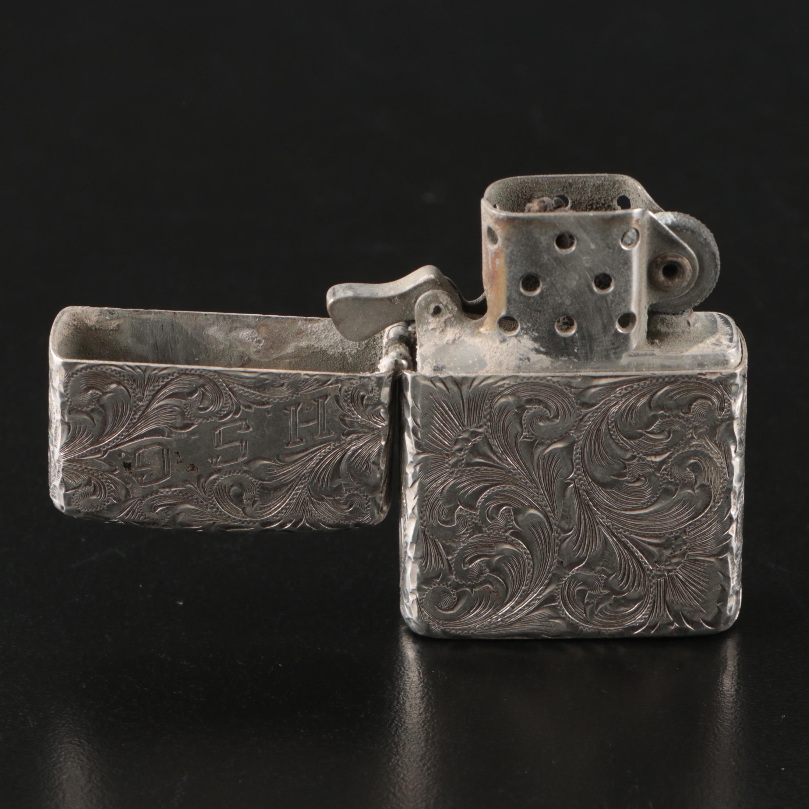 Zippo Sterling Silver Chased Lighter, 20th Century