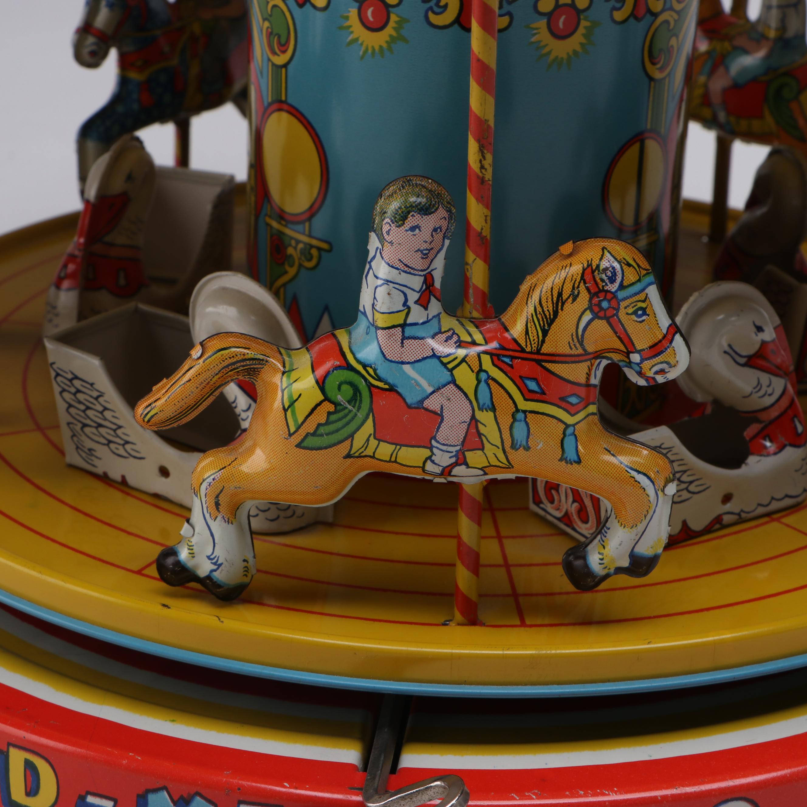 J. Chein & Co. Vintage Wind-Up Tin Merry-Go Round, and Other Tin Toys