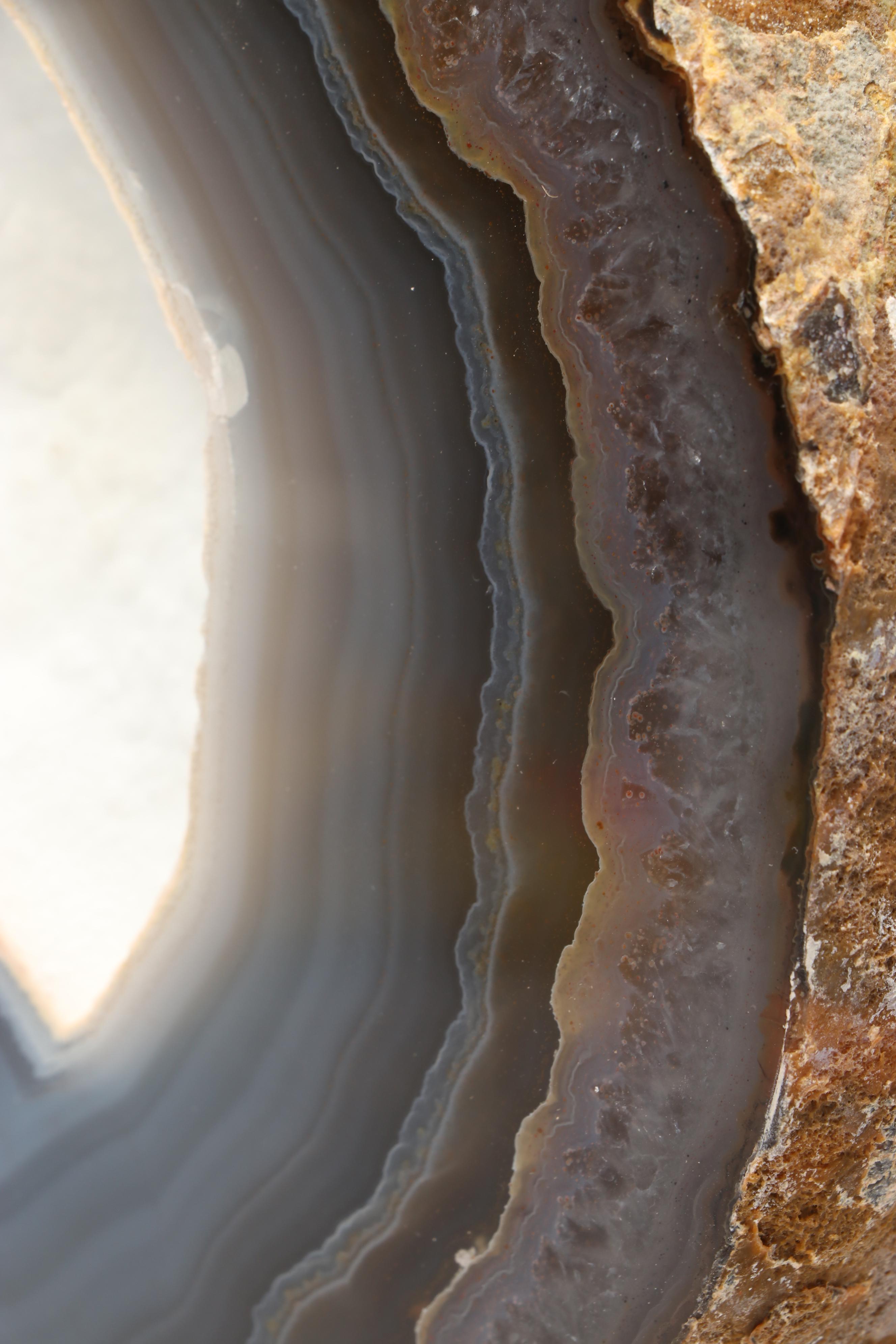 Thunderegg Half with Blue Lace and Banded Agate on Custom Stand
