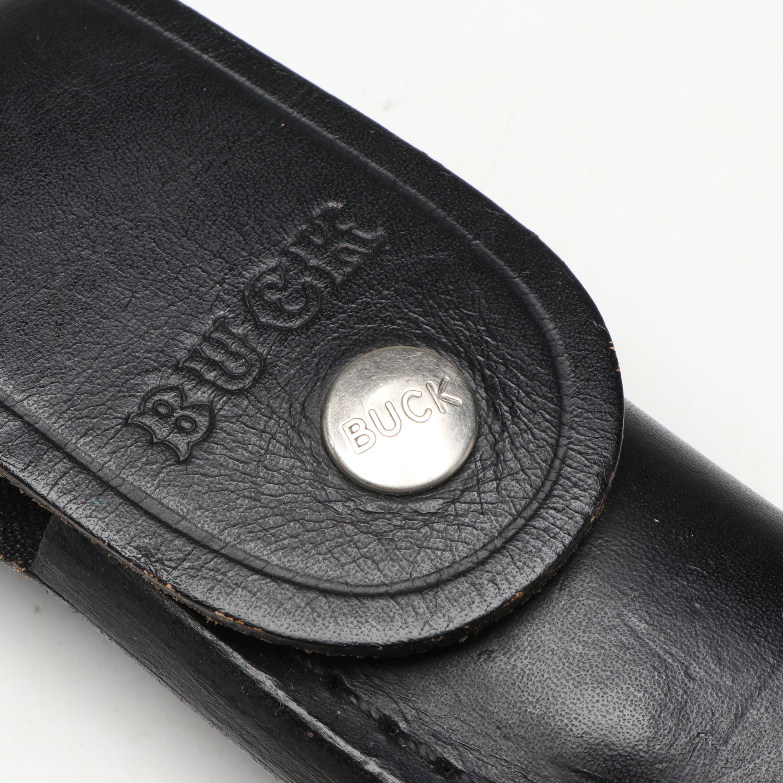 Buck Fixed Blade Knife with Other Folding Knives and Leather Cases