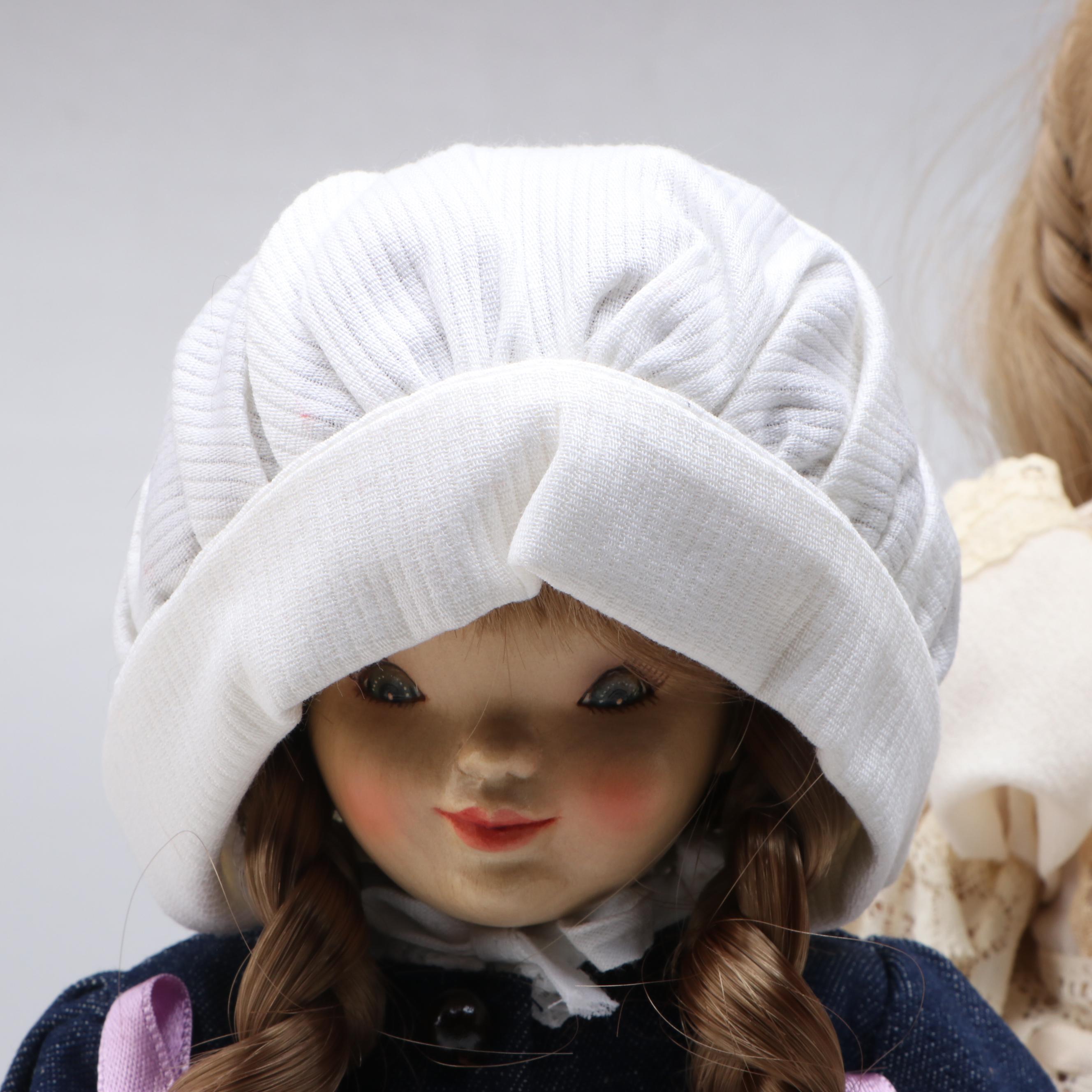 Italian Arianna "Evelina" Bisque Doll and ANRI "Margarite" Wood Doll by Juan Fer