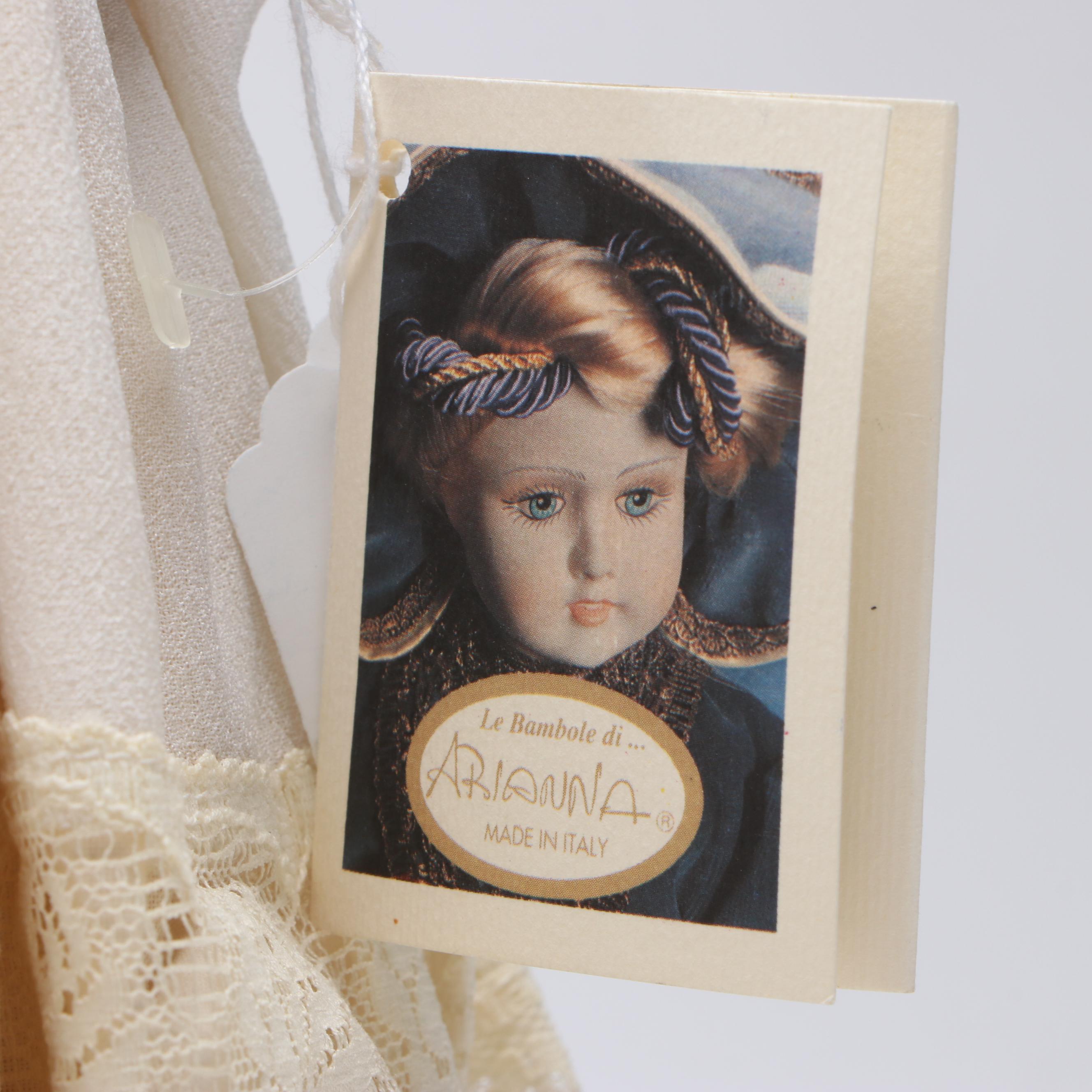 Italian Arianna "Evelina" Bisque Doll and ANRI "Margarite" Wood Doll by Juan Fer