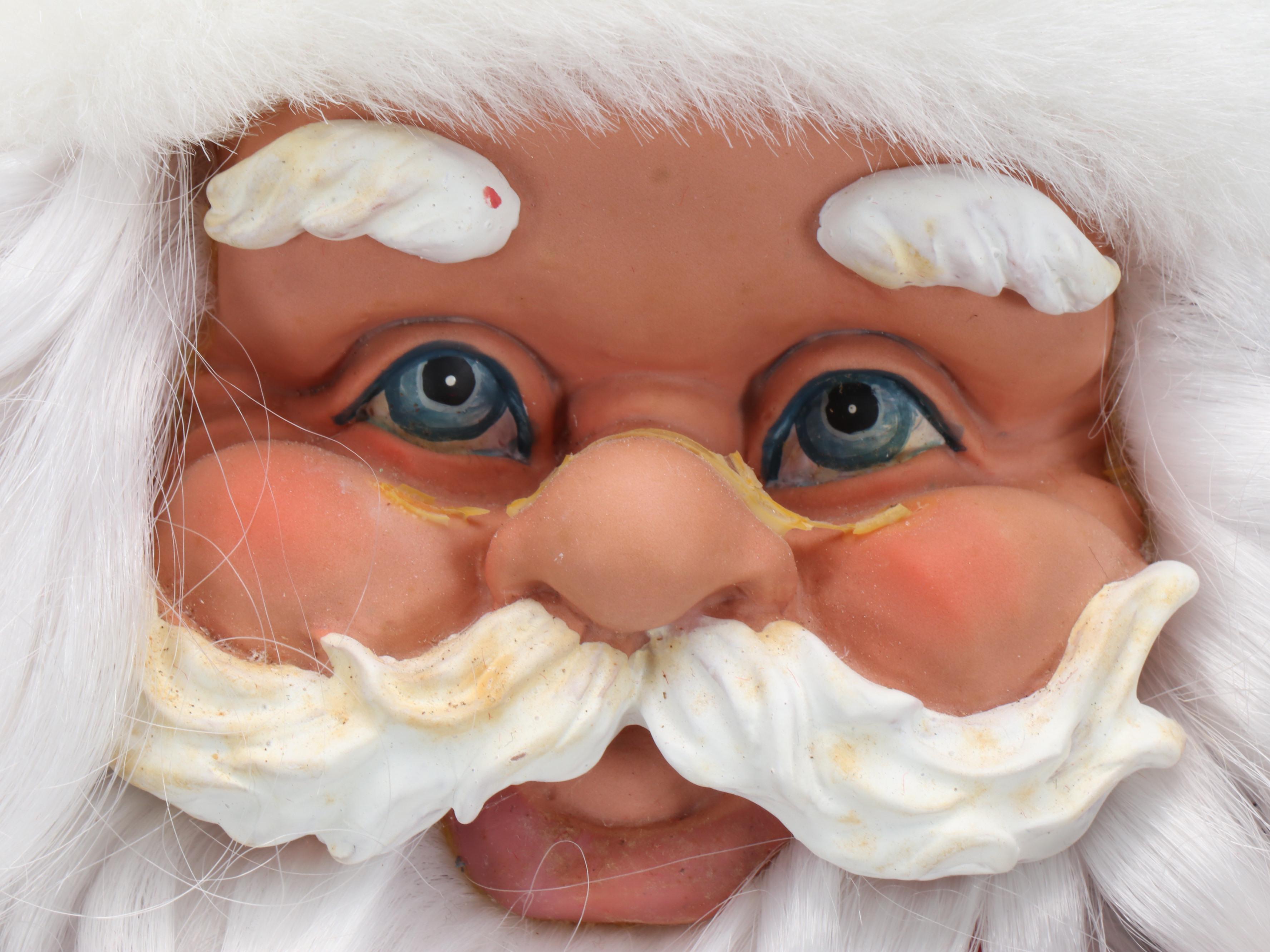 Nice List and Pointing Santa Claus Dolls