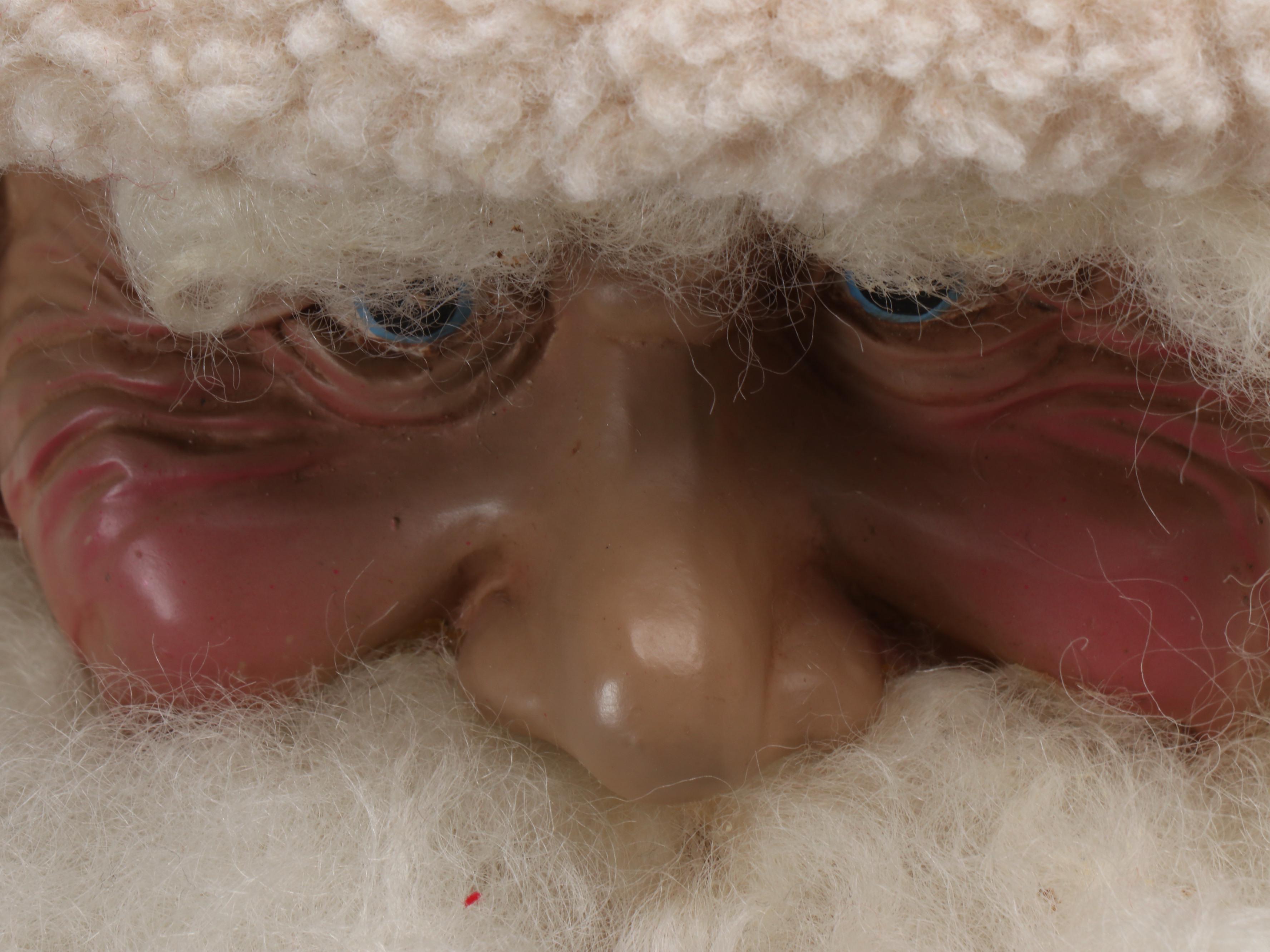 Nice List and Pointing Santa Claus Dolls