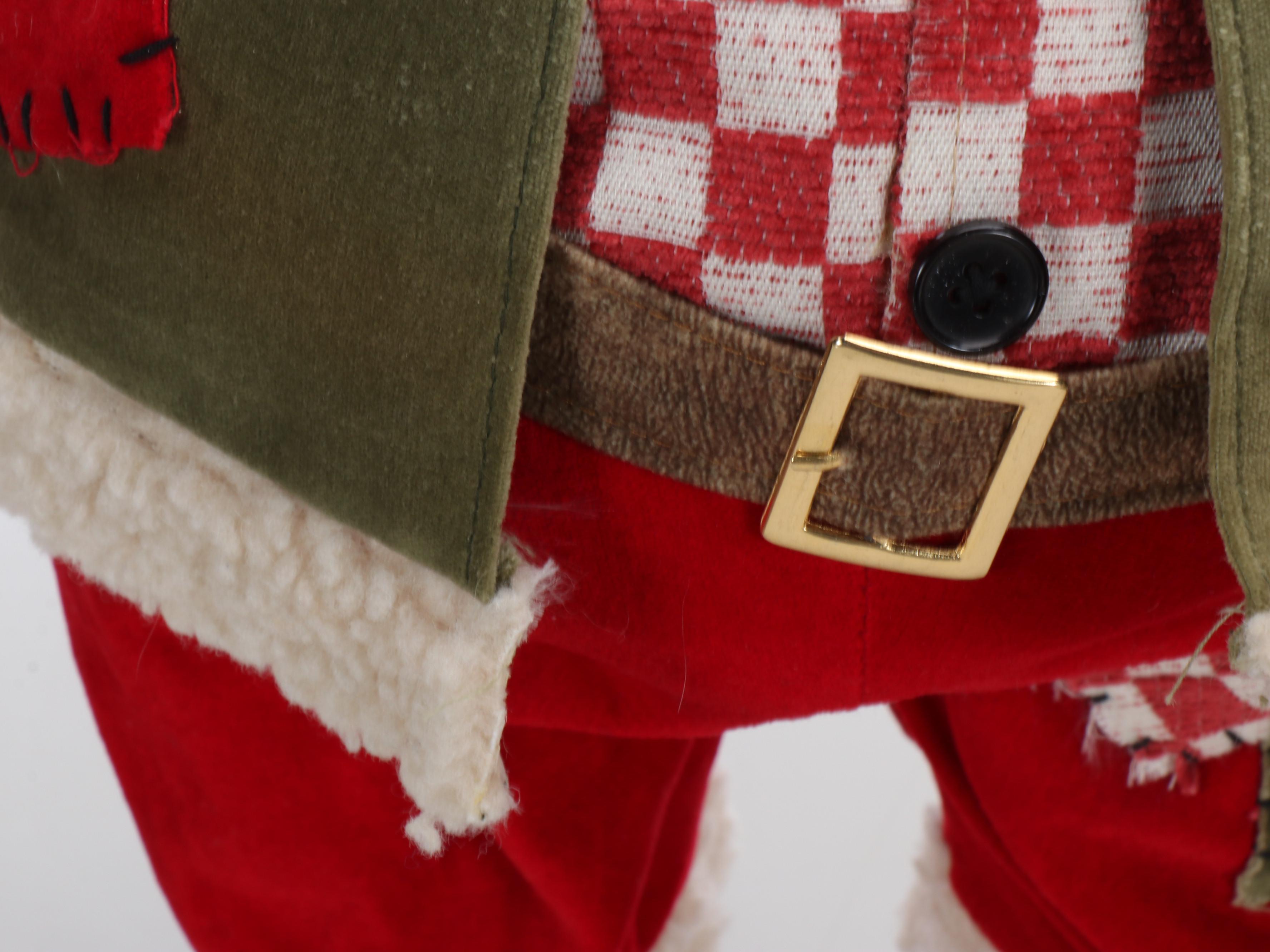 Nice List and Pointing Santa Claus Dolls