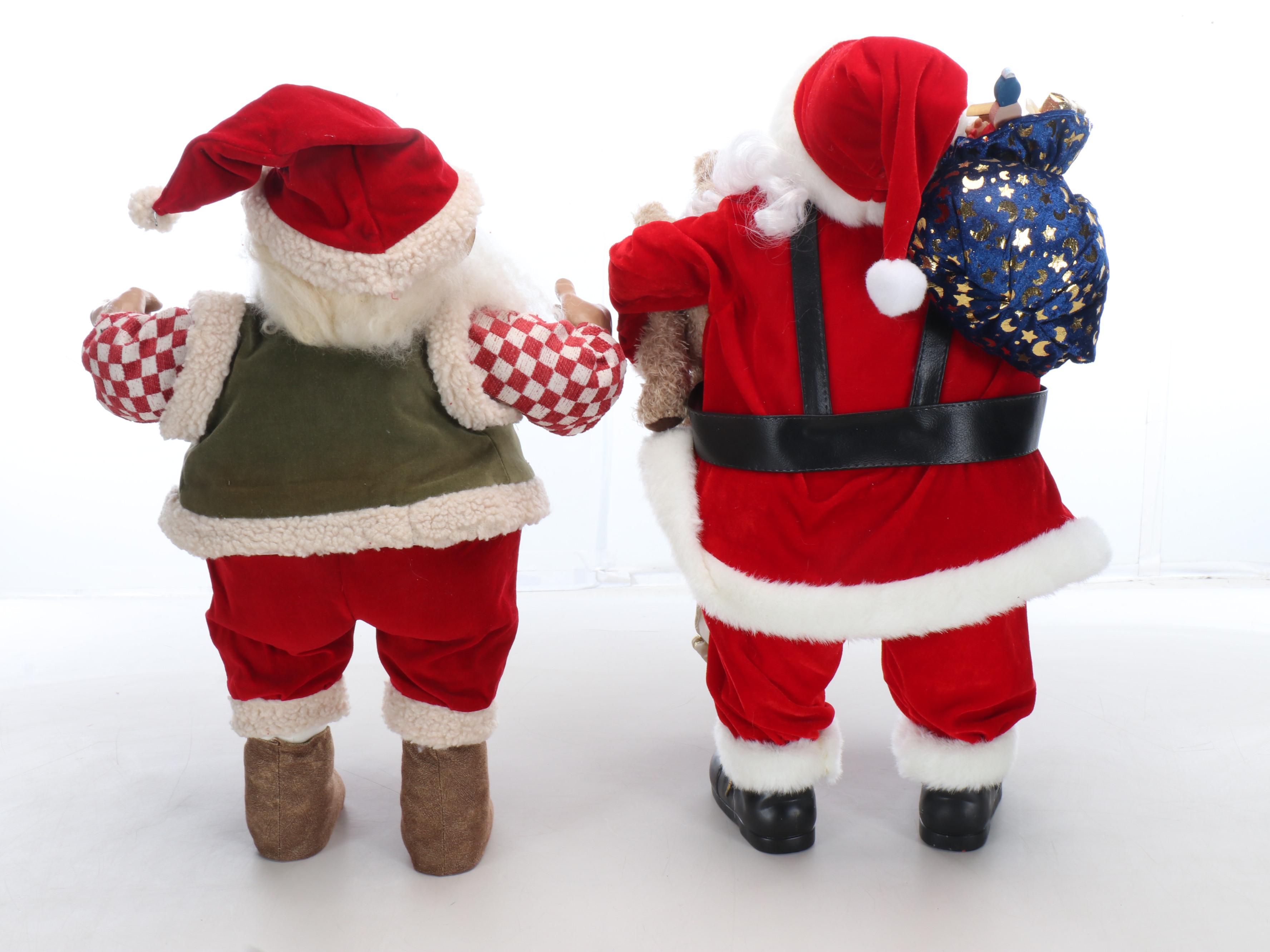 Nice List and Pointing Santa Claus Dolls