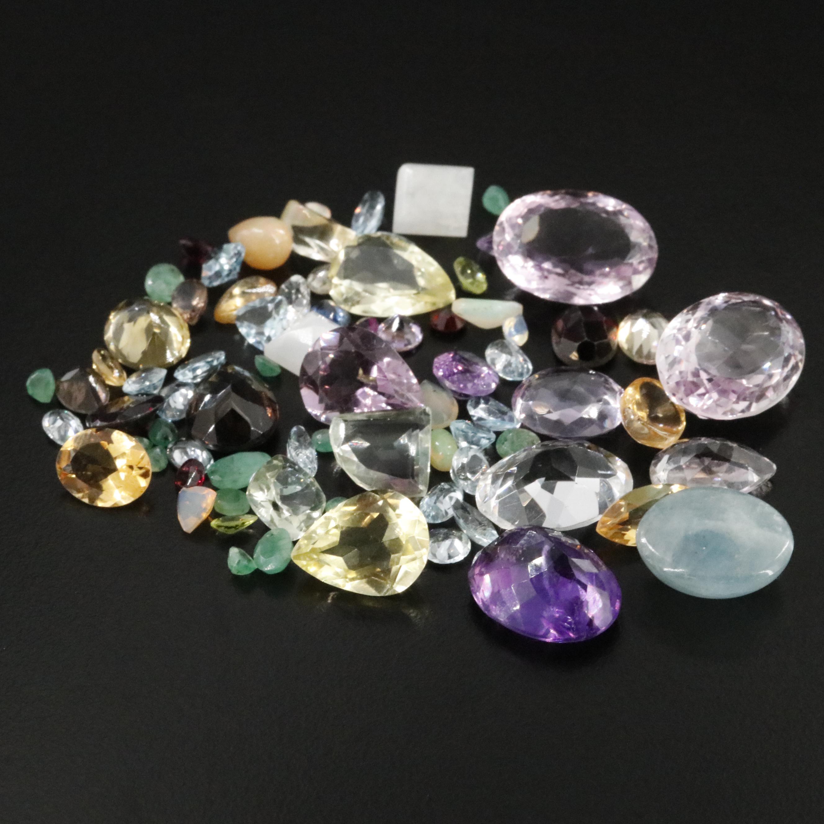 Loose 138.28 CTW Mixed Gemstone Lot with Amethyst, Citrine and Blue Topaz