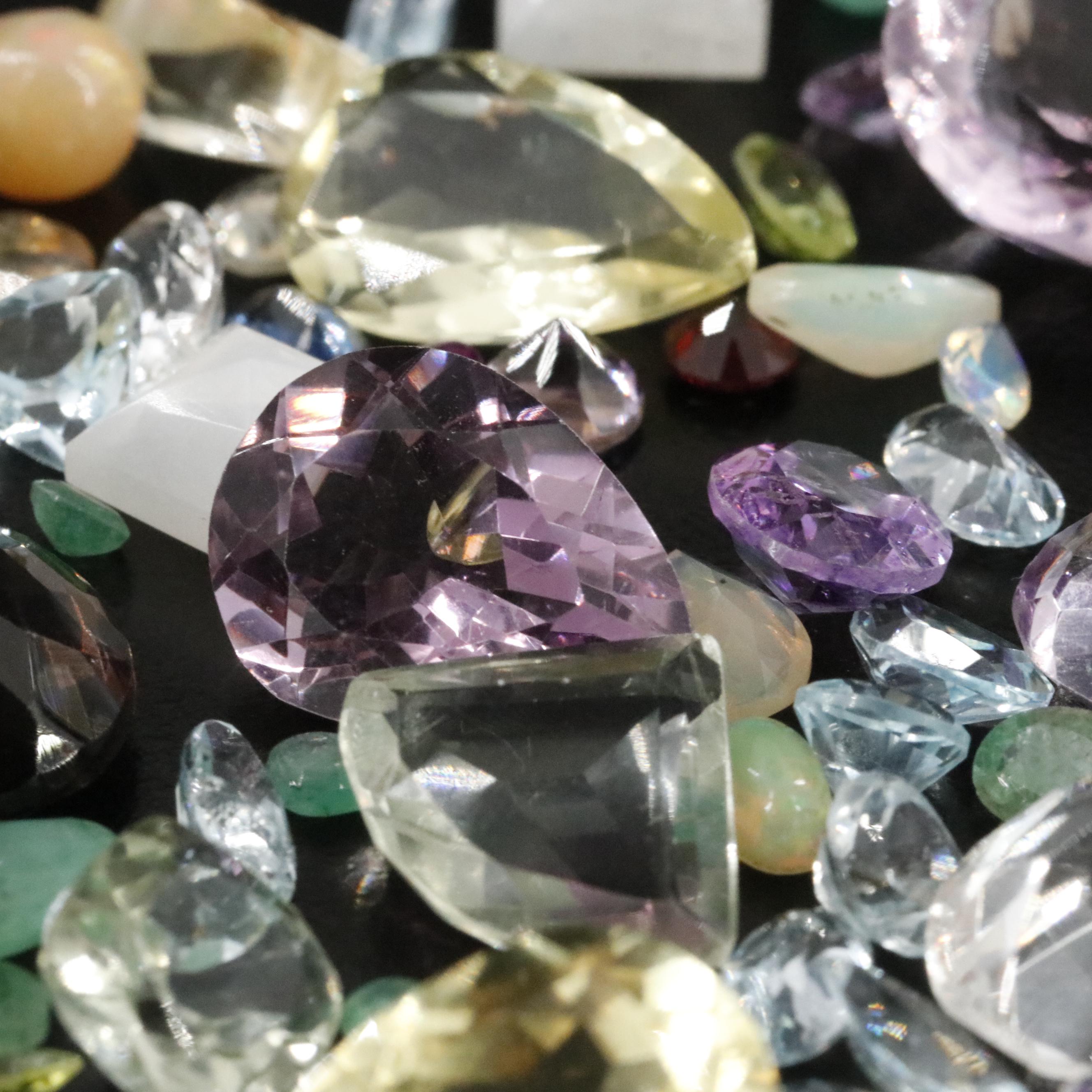 Loose 138.28 CTW Mixed Gemstone Lot with Amethyst, Citrine and Blue Topaz