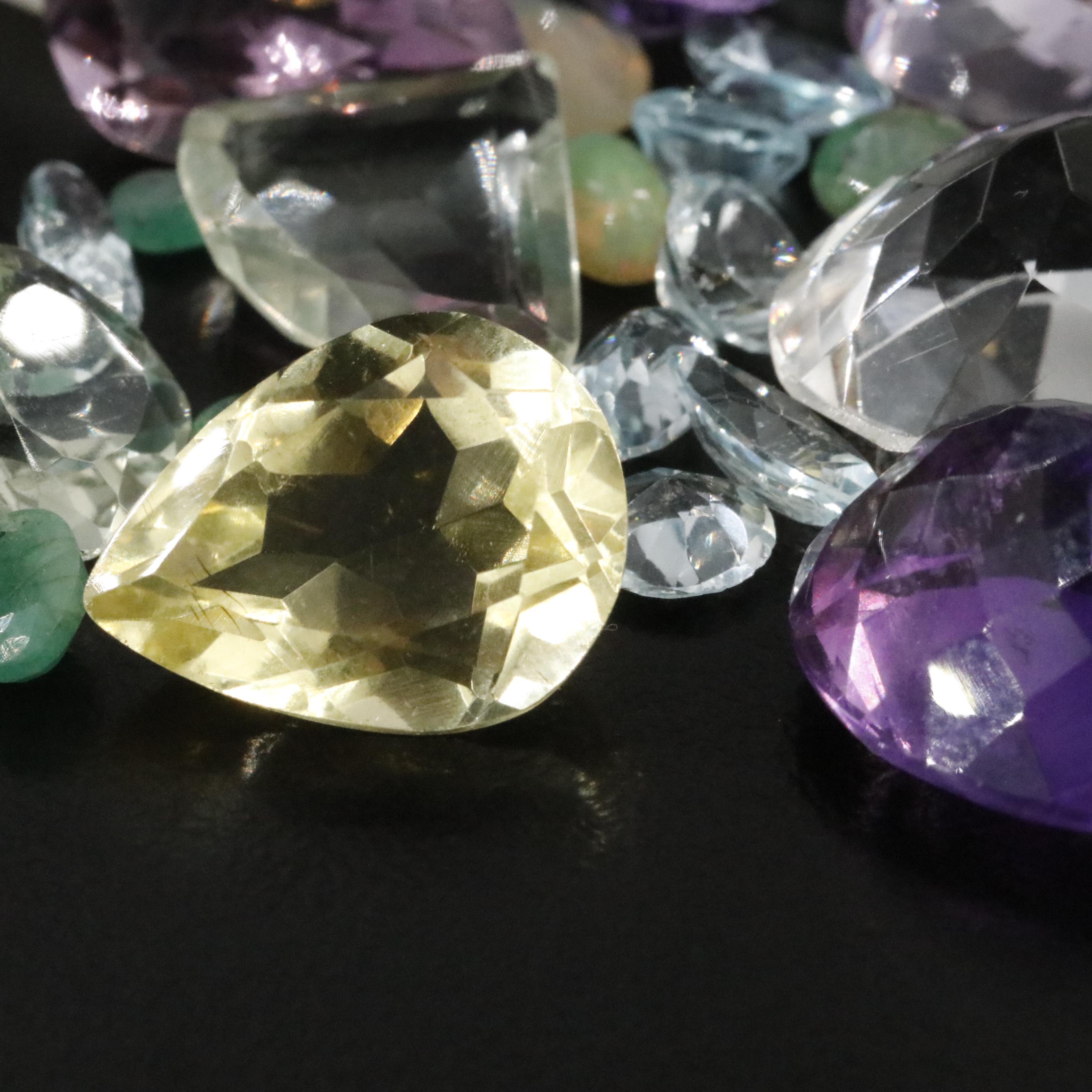 Loose 138.28 CTW Mixed Gemstone Lot with Amethyst, Citrine and Blue Topaz
