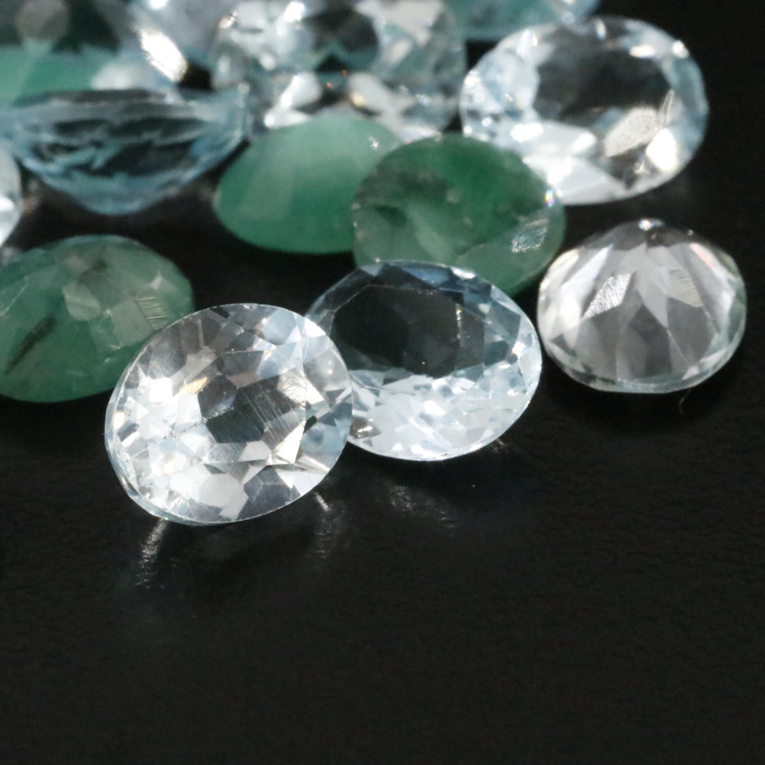 Loose 54.00 CTW Emerald, Aquamarine and Blue Topaz Lot