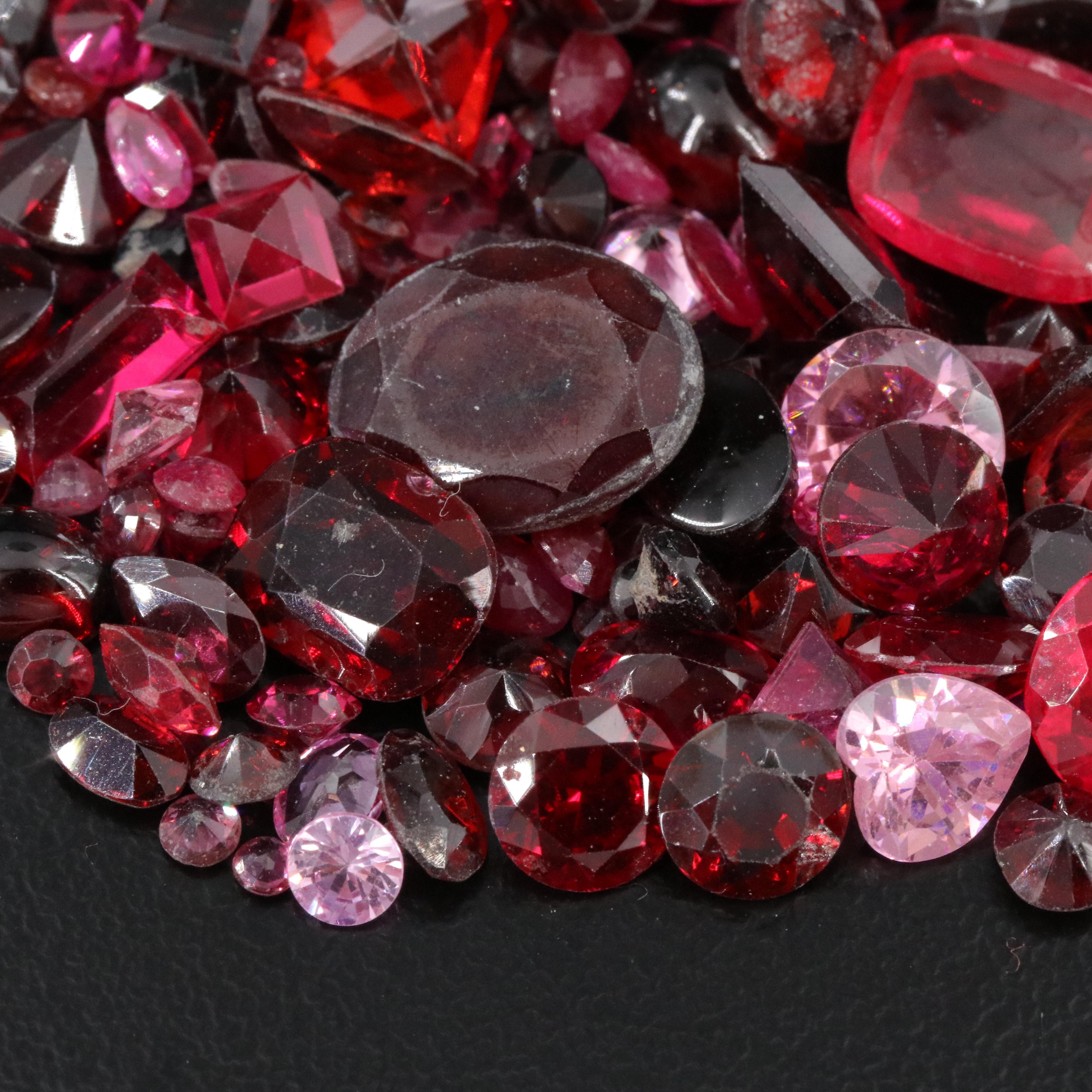 Loose 154.09 CTW Gemstone Lot Including Garnet, CZ and Lab Grown Ruby