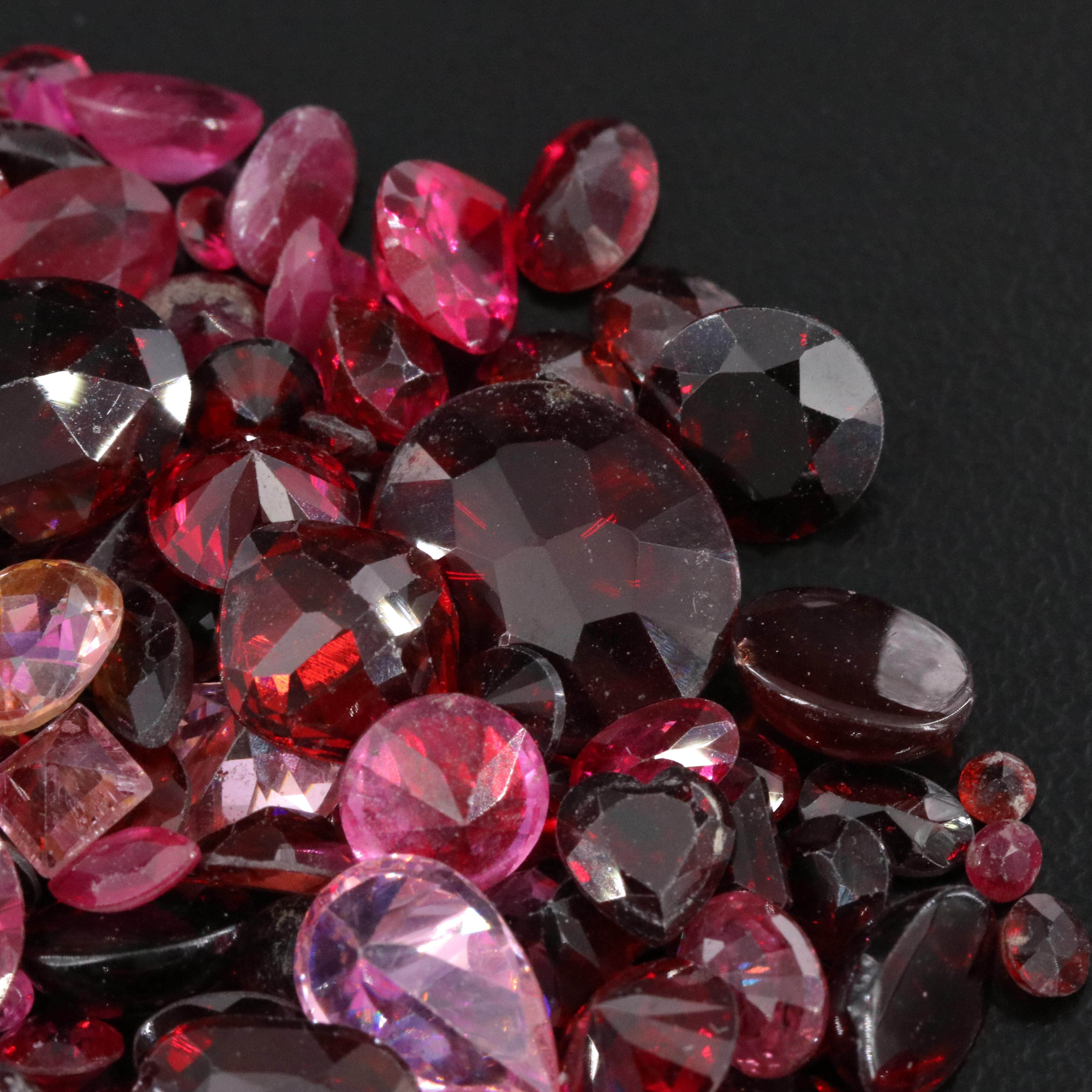 Loose 154.09 CTW Gemstone Lot Including Garnet, CZ and Lab Grown Ruby