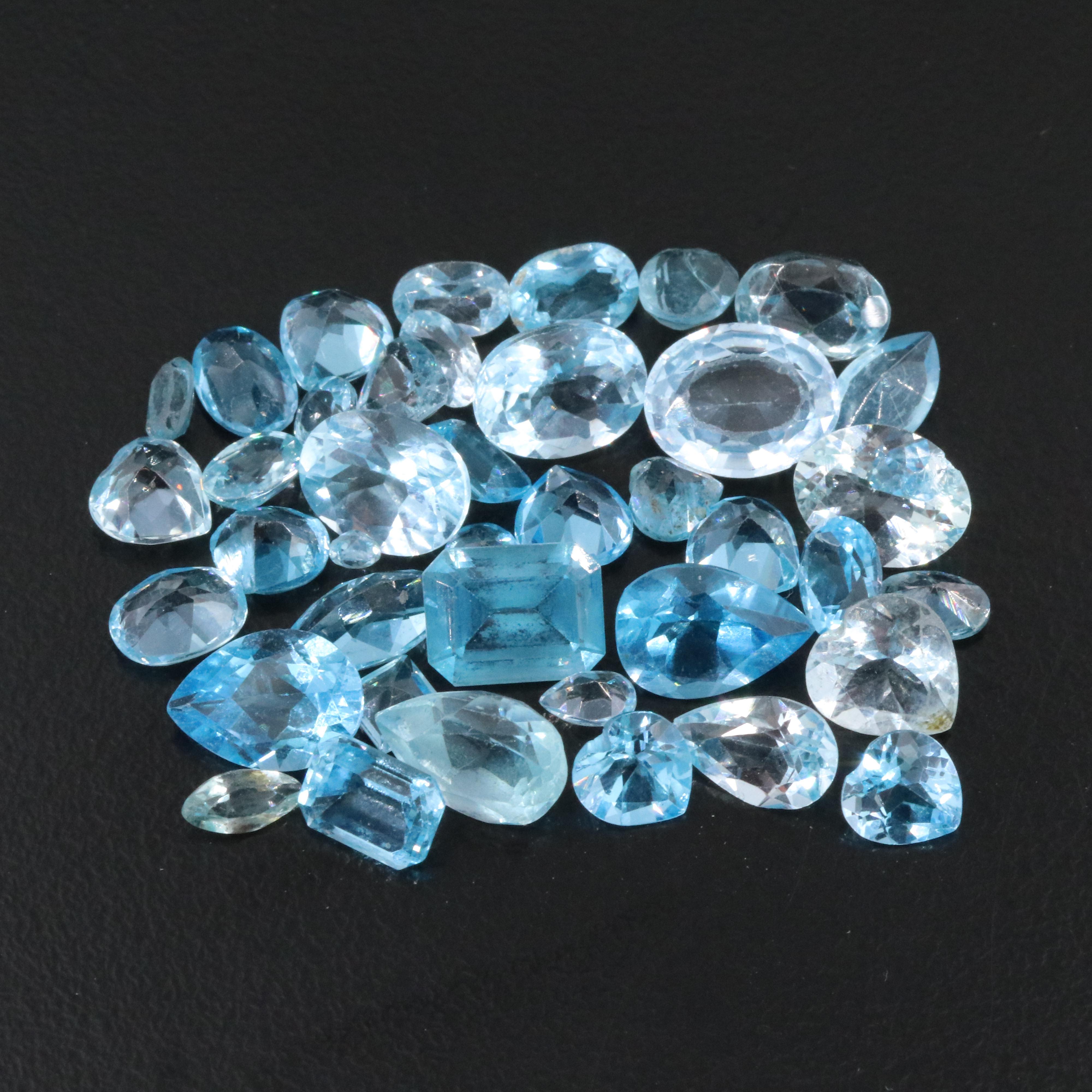 Loose 44.93 CTW Gemstone Lot Including Topaz, Aquamarine and Lab Grown Spinel