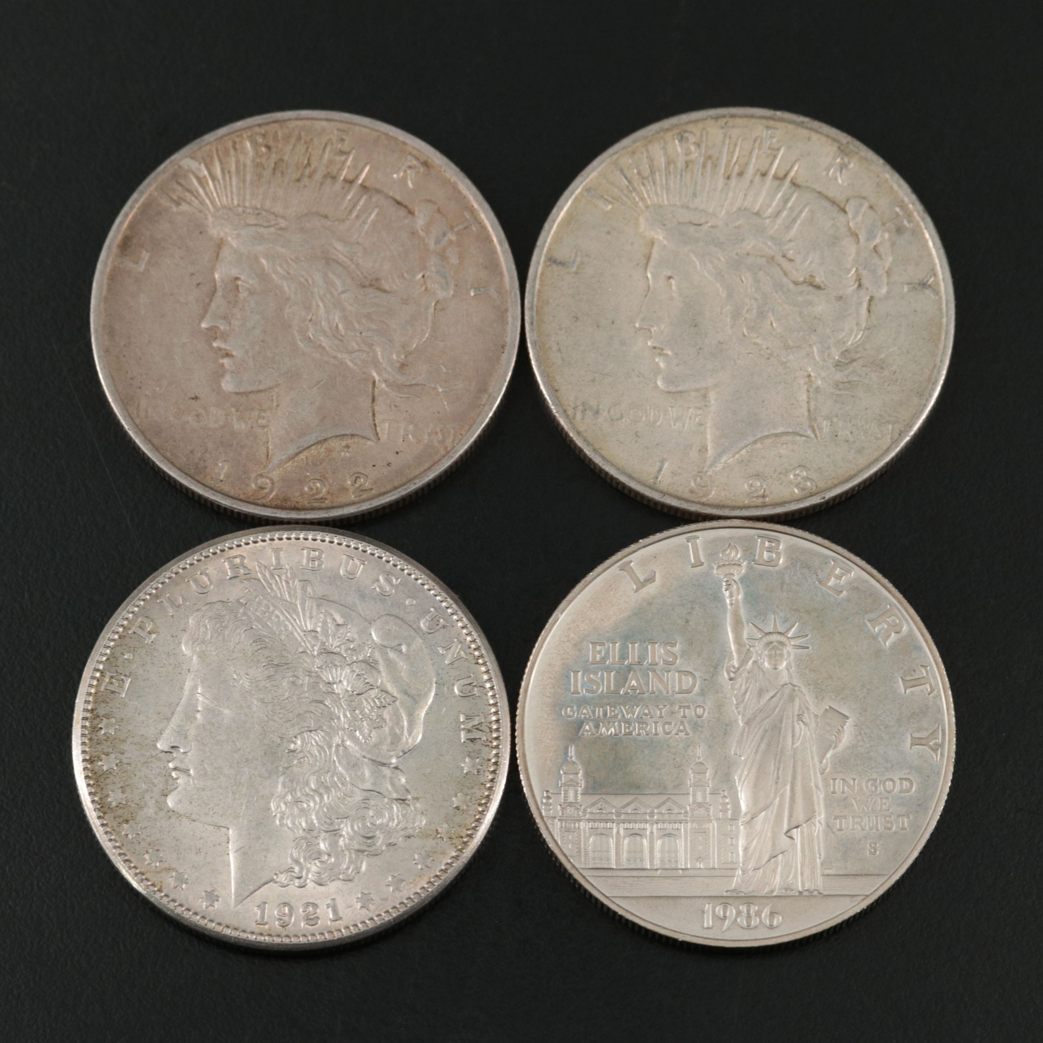 Four U.S. Silver Dollars, Peace, Morgan and Commemorative