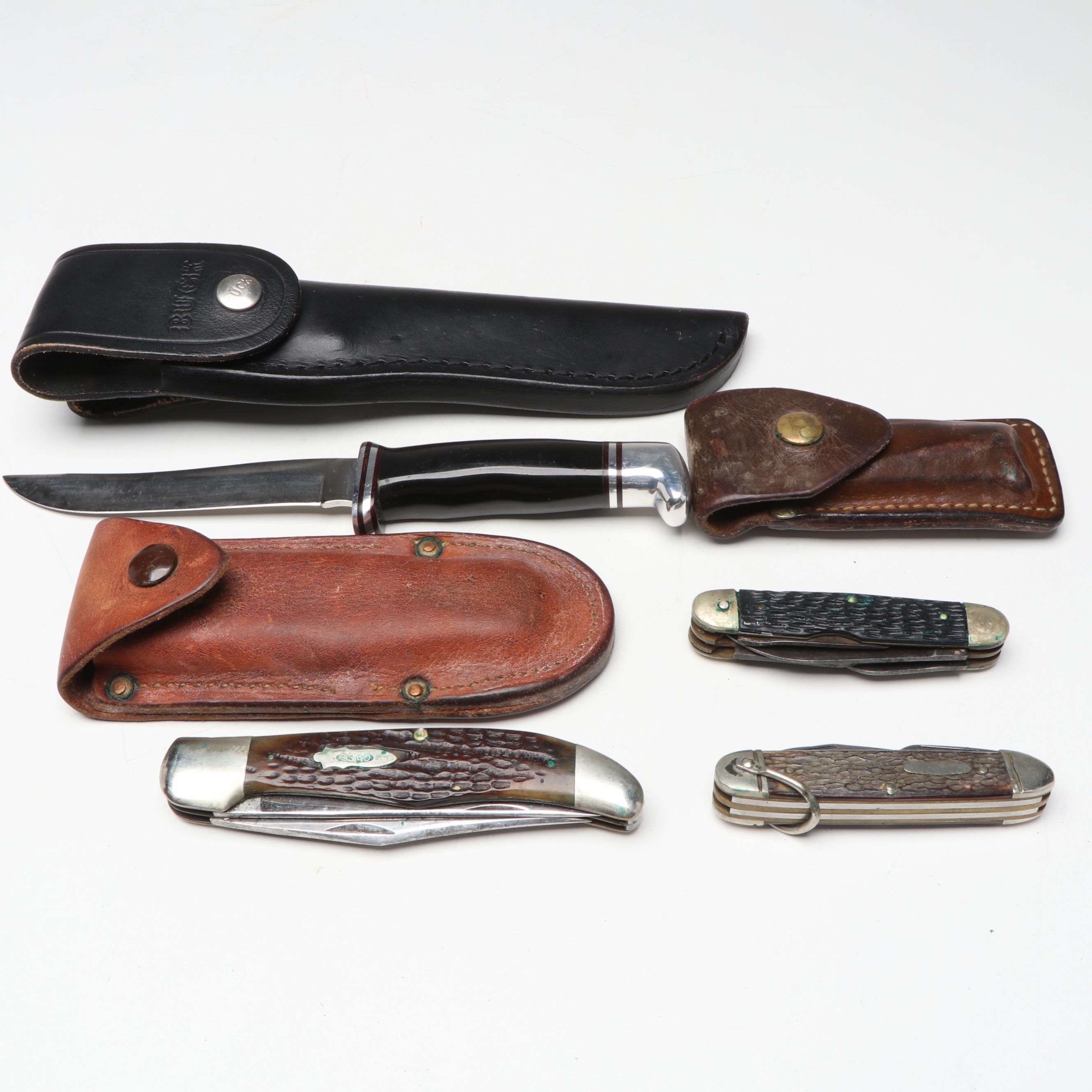 Buck Fixed Blade Knife with Other Folding Knives and Leather Cases
