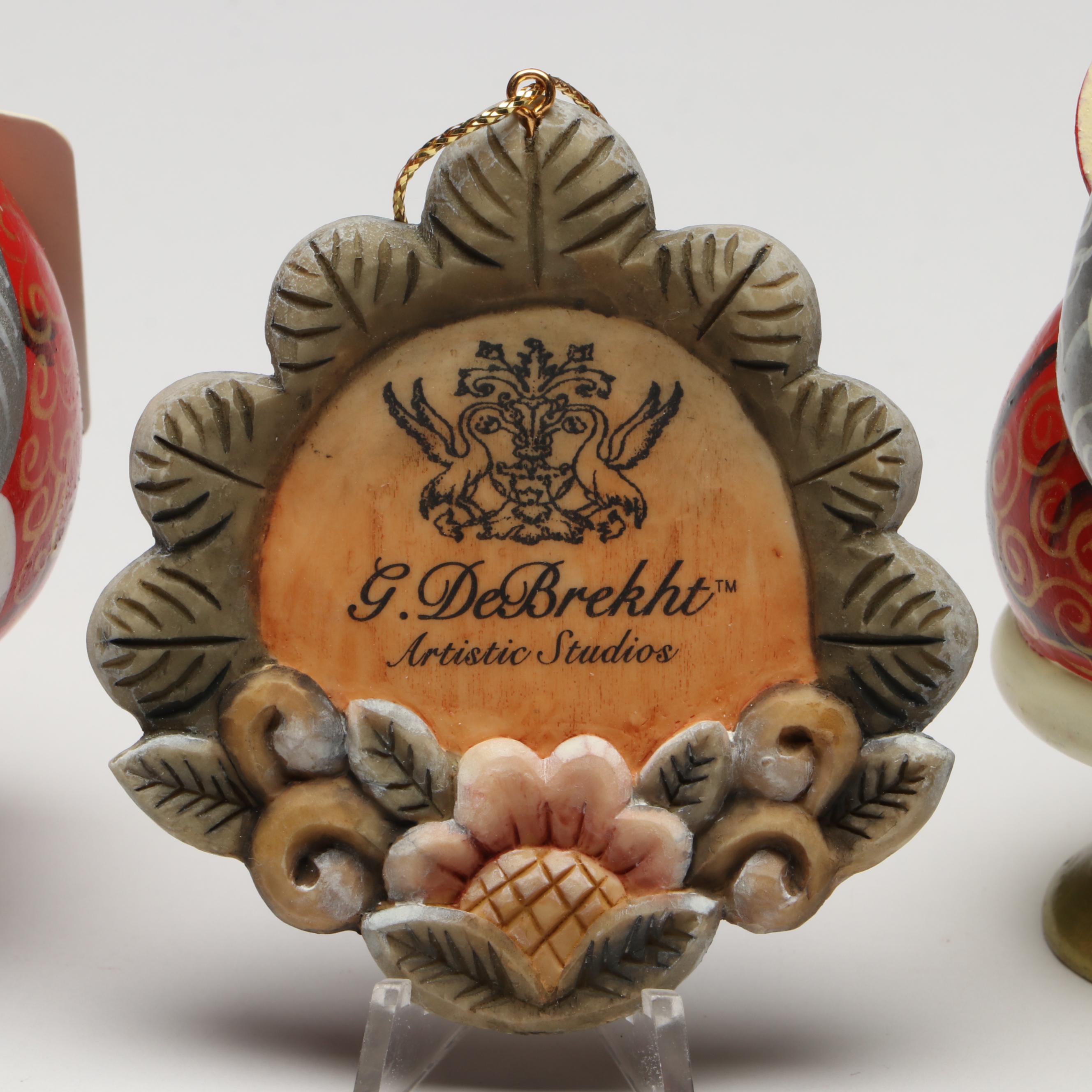 G. DeBrekht Hand-Painted Wooden Santa Claus Ornaments